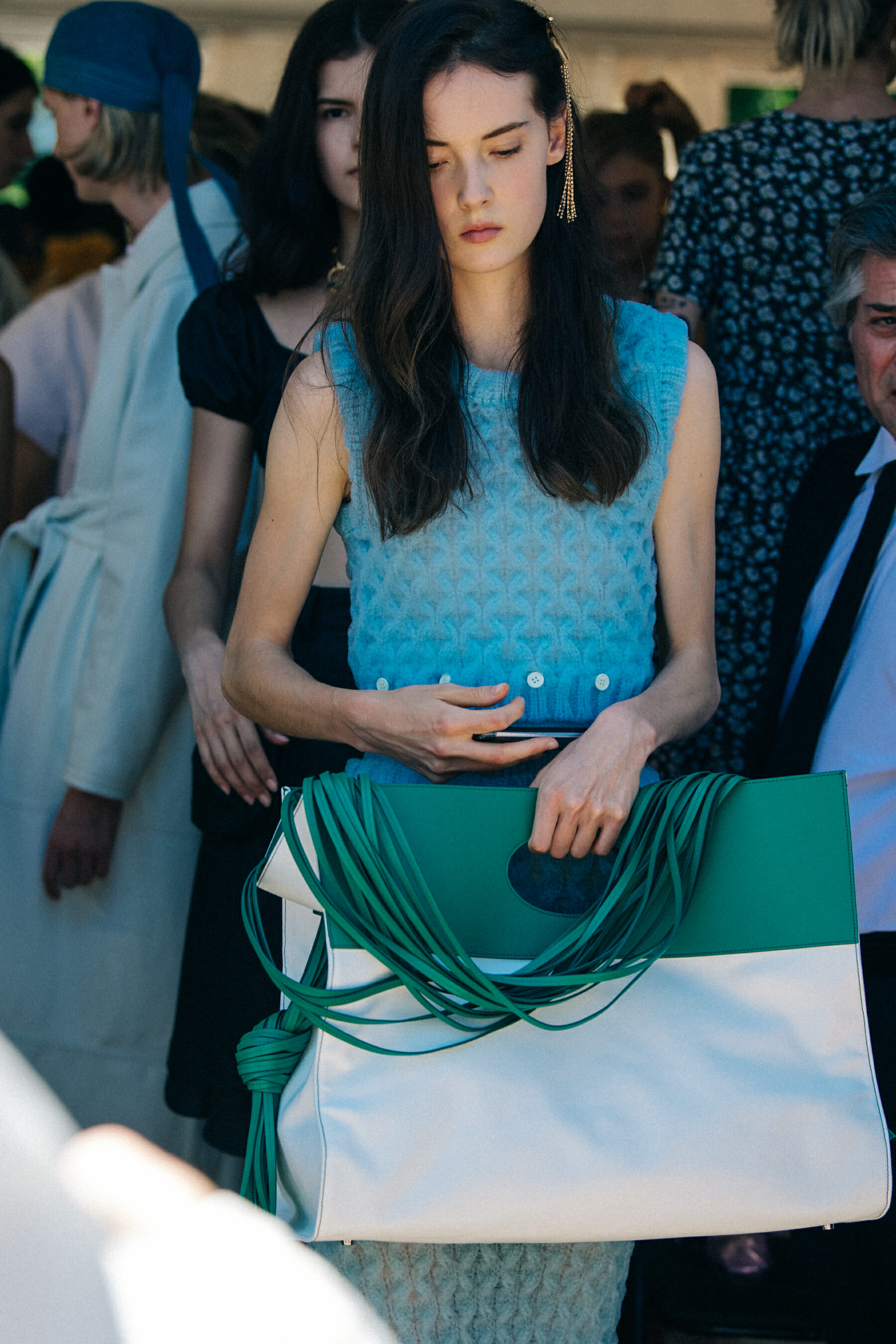 Model wearing colourful Sunnei outfit