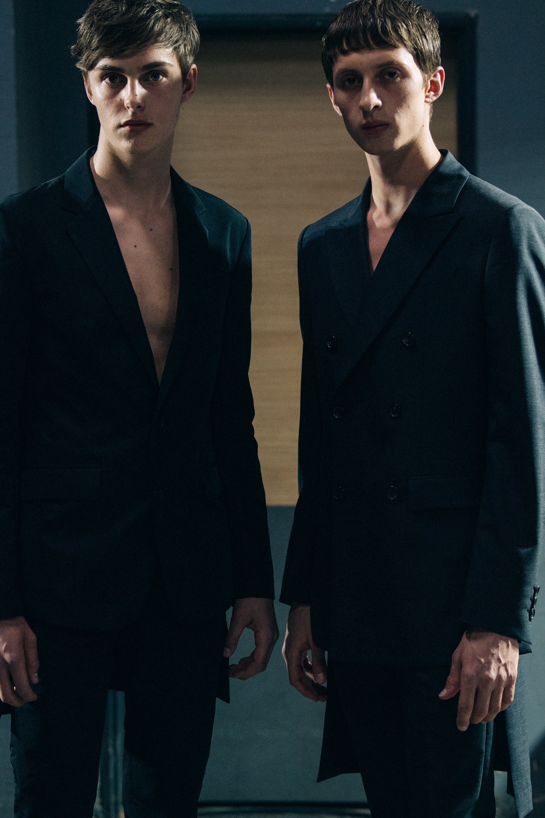 Model wearing black Undercover suit