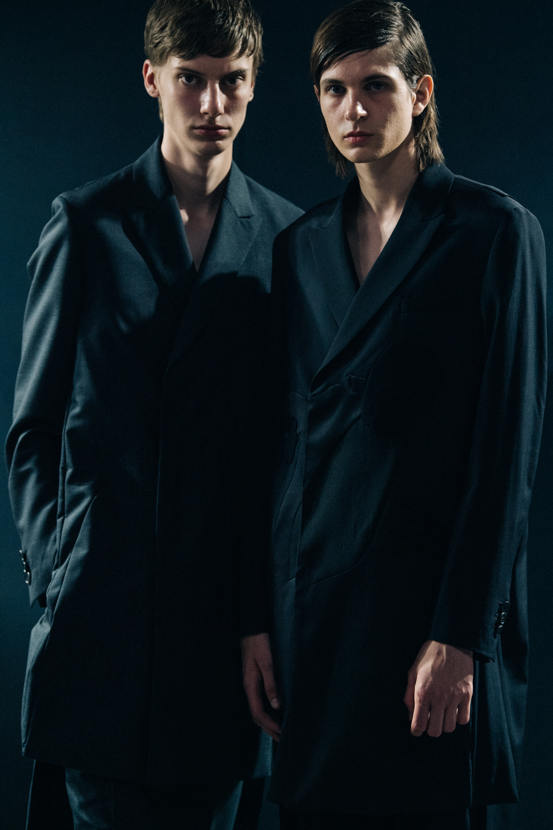 Model wearing black Undercover suit