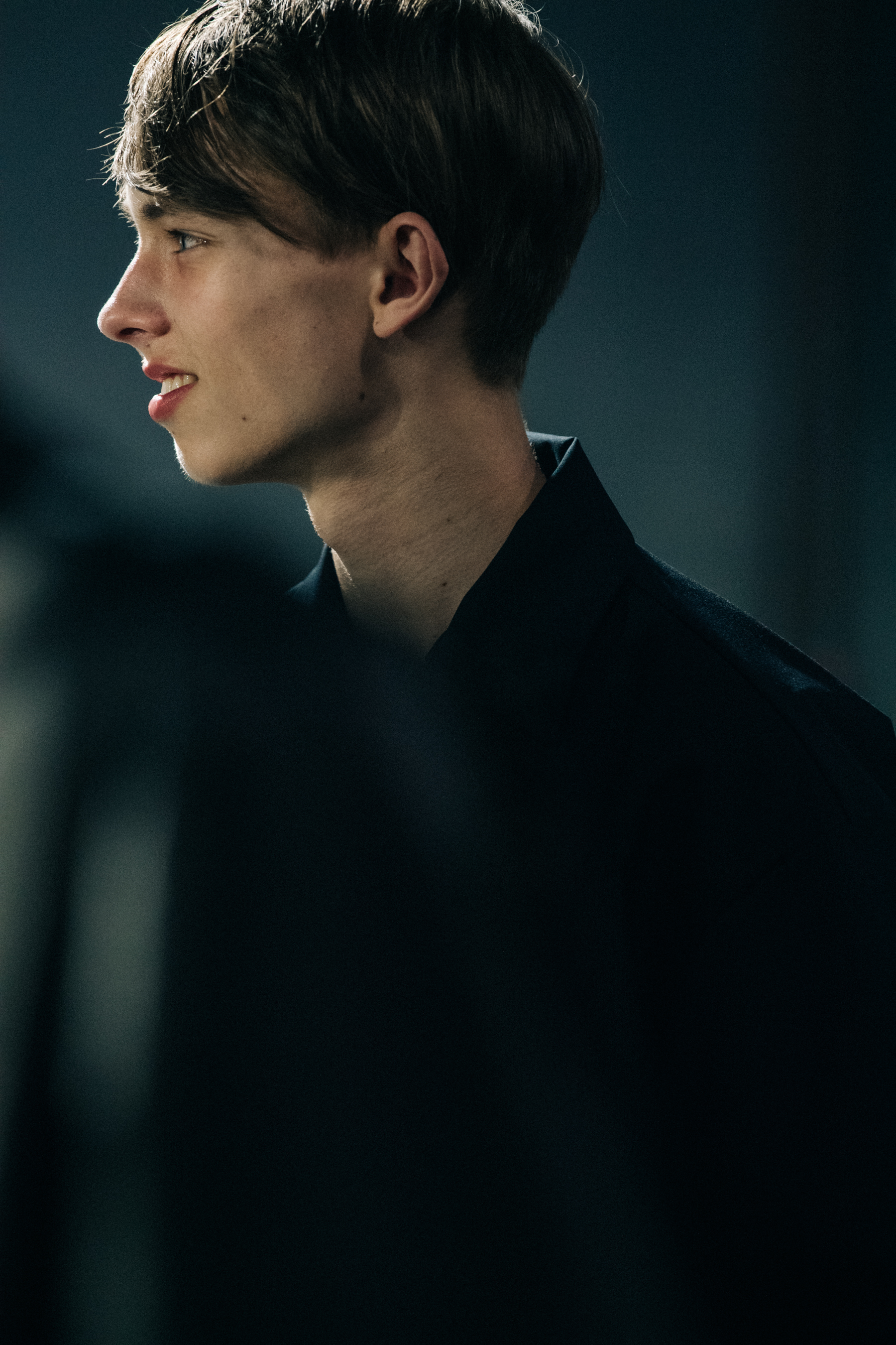 Model wearing black Undercover suit