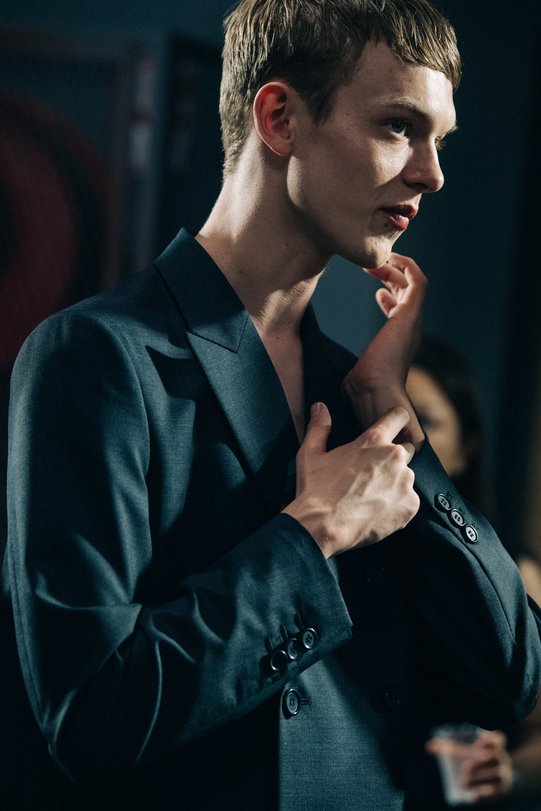 Model wearing black Undercover suit