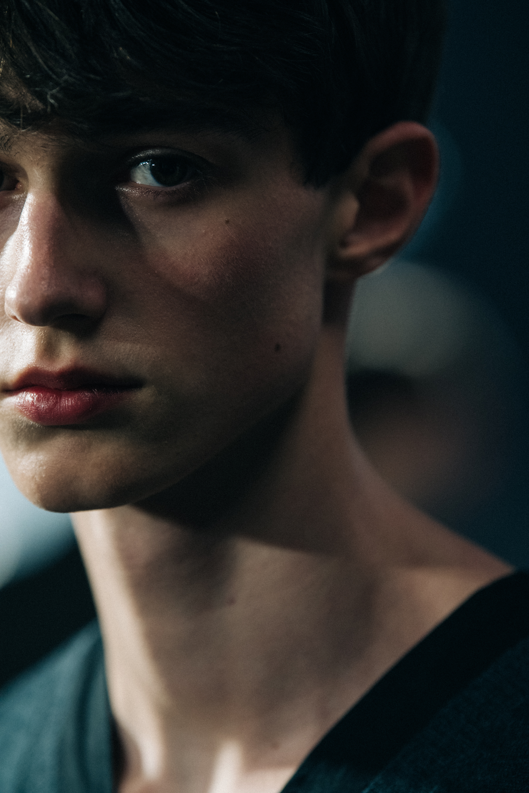 Model wearing black Undercover suit