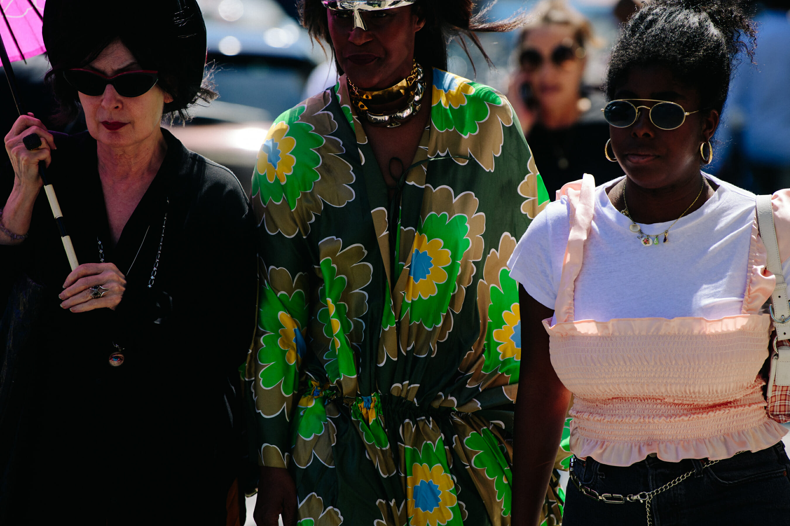 Three women wearing fashion clothes