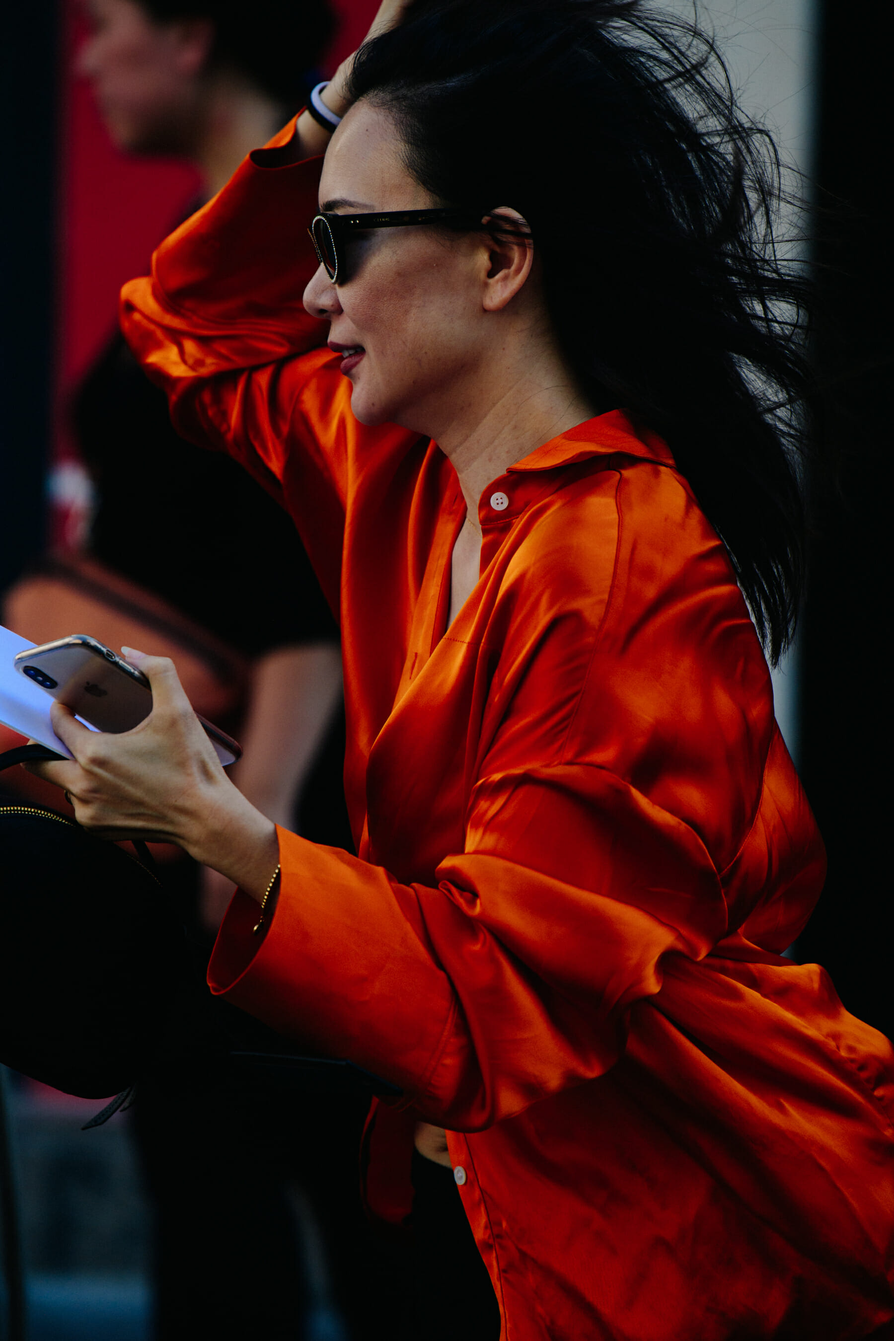 Woman wearing orange shirt