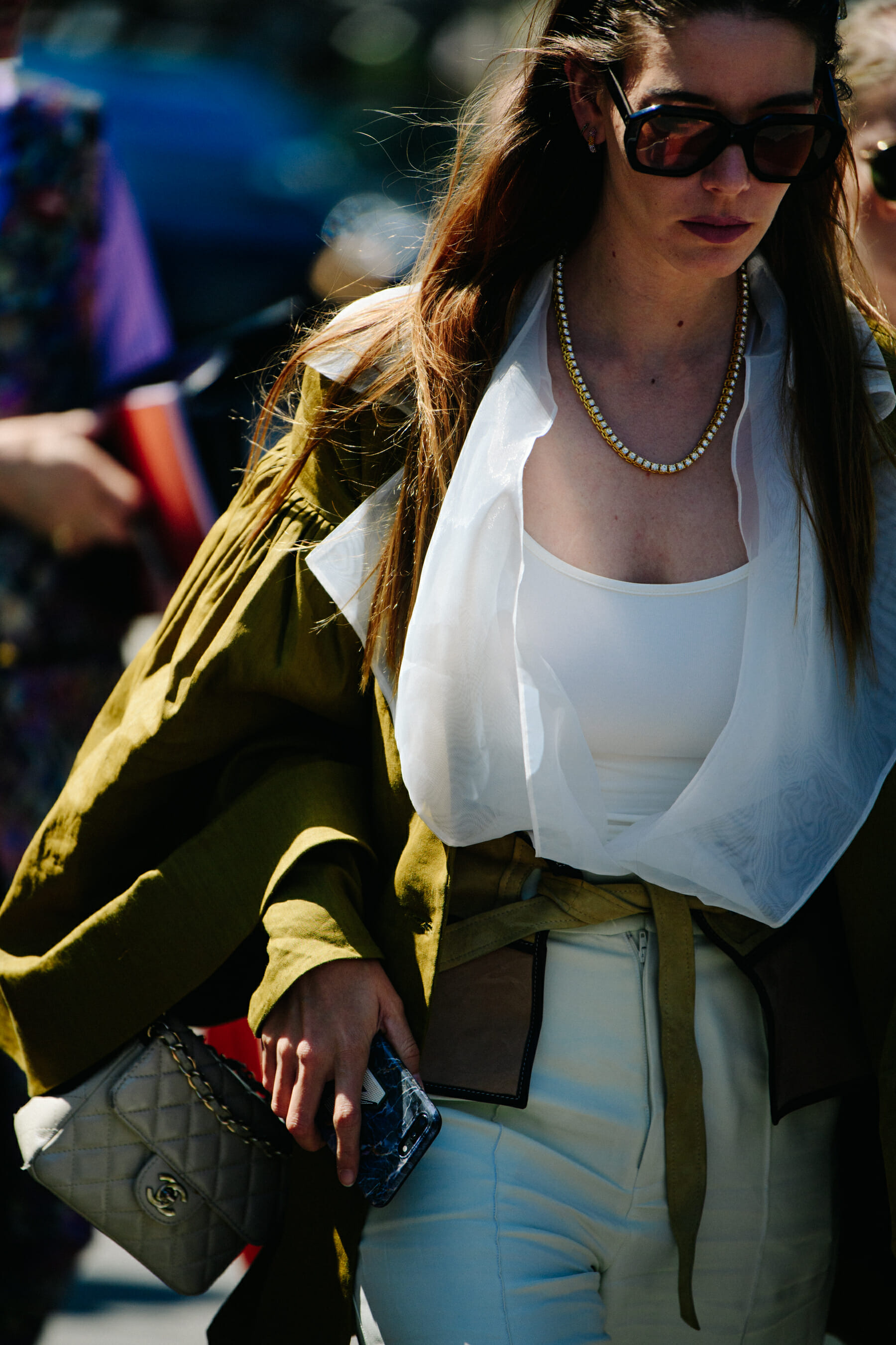 Woman carrying Chanel bag