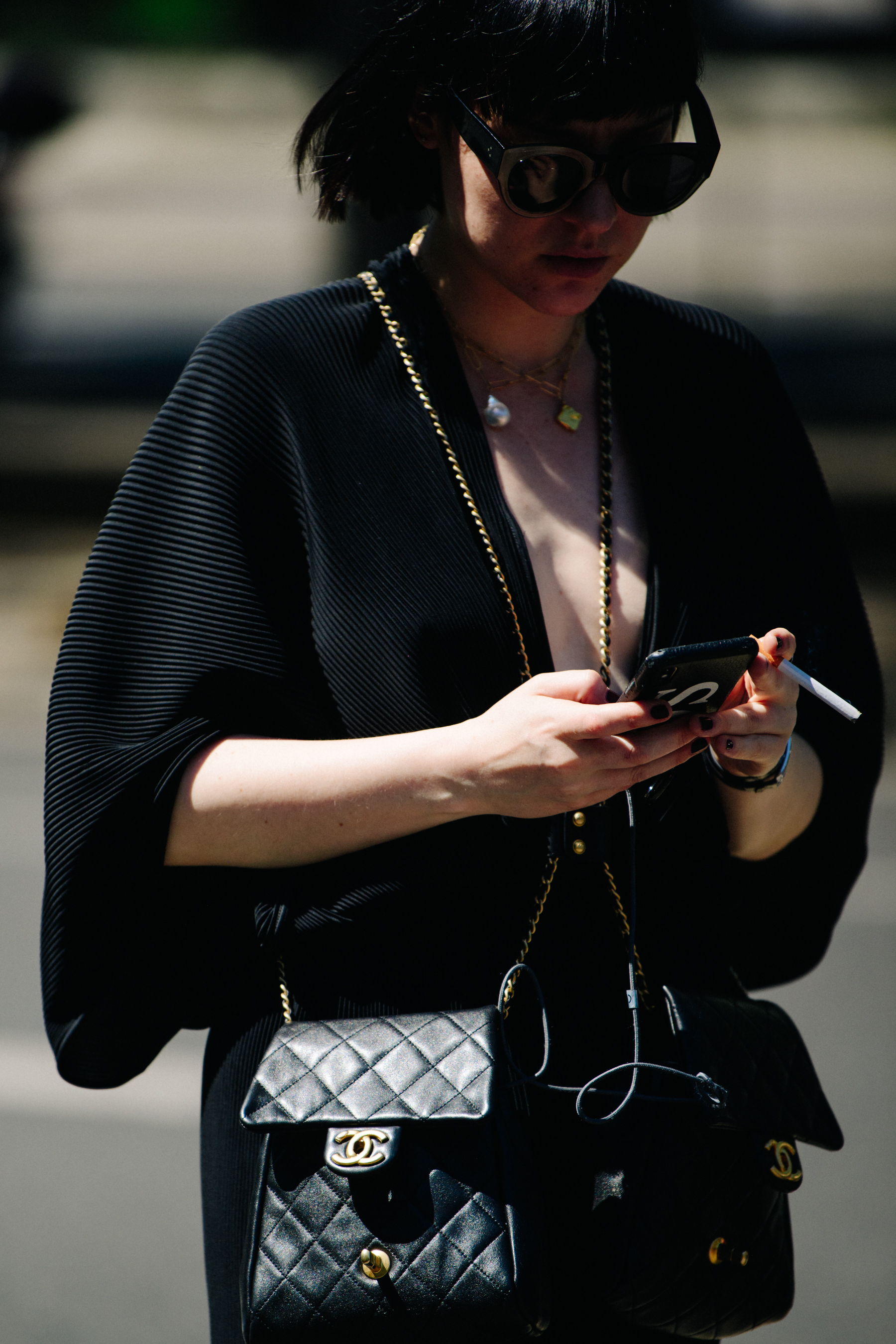 Woman carrying Chanel bag