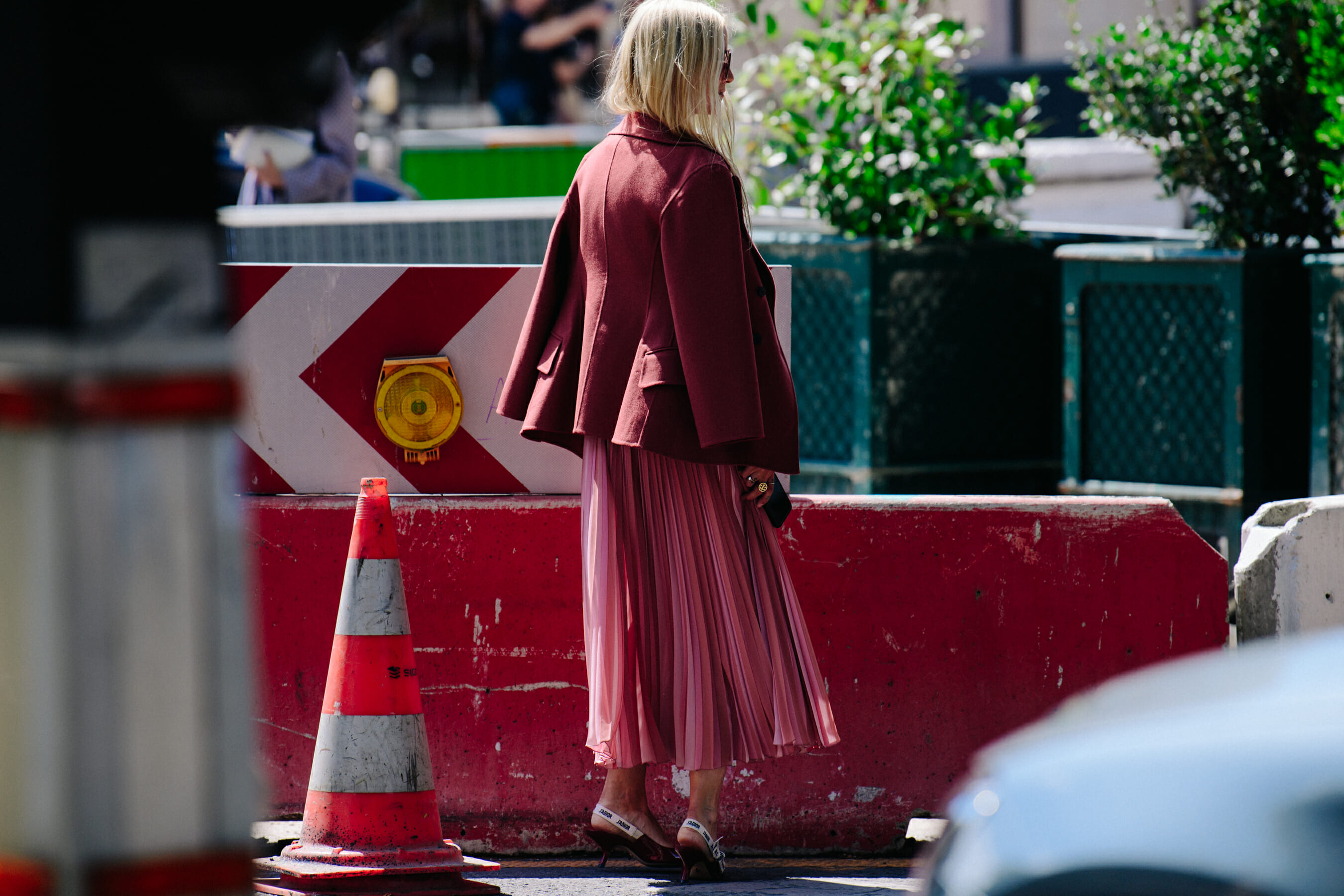 Woman wearing pink Christian Dior outfit
