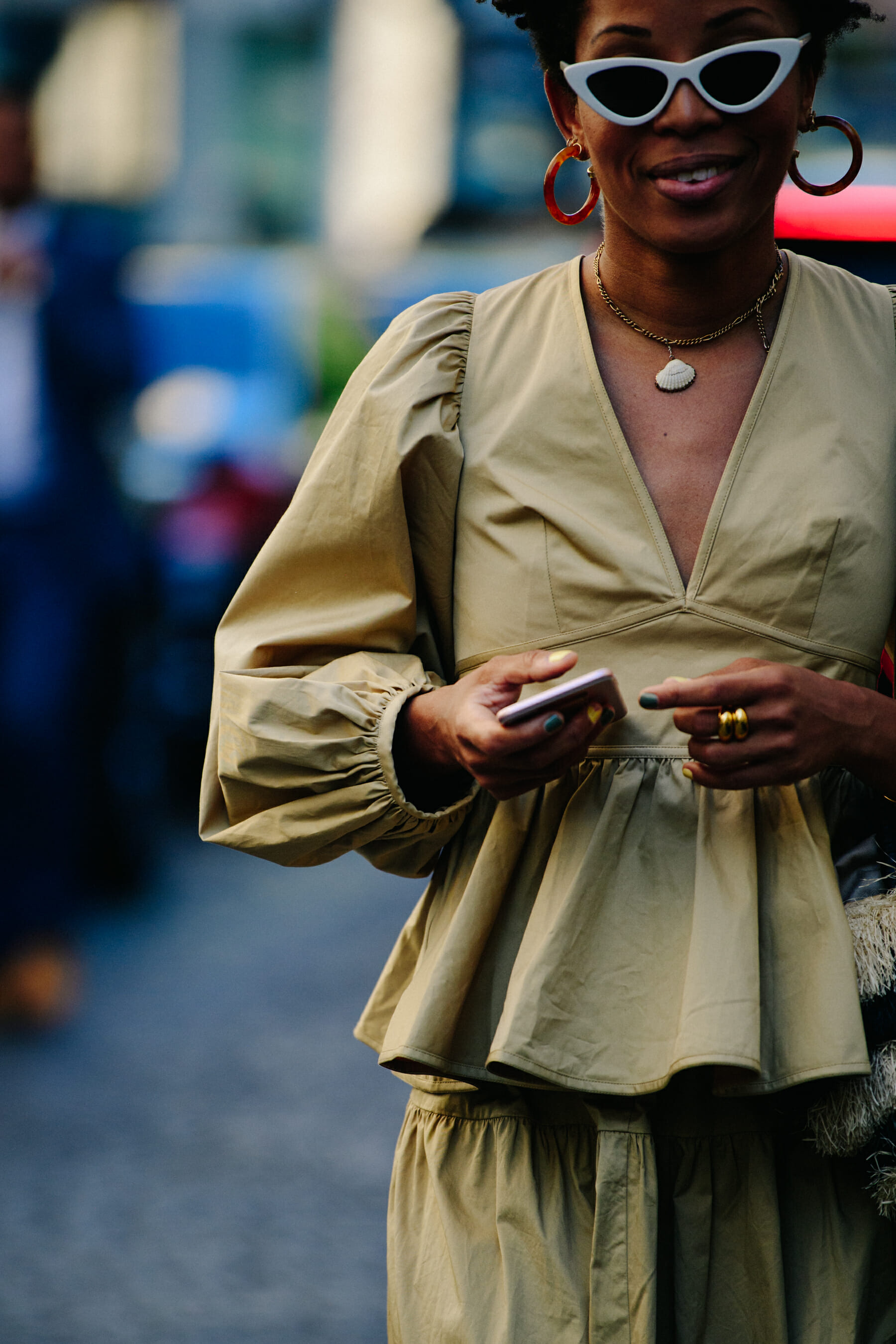 Woman wearing tan outfit