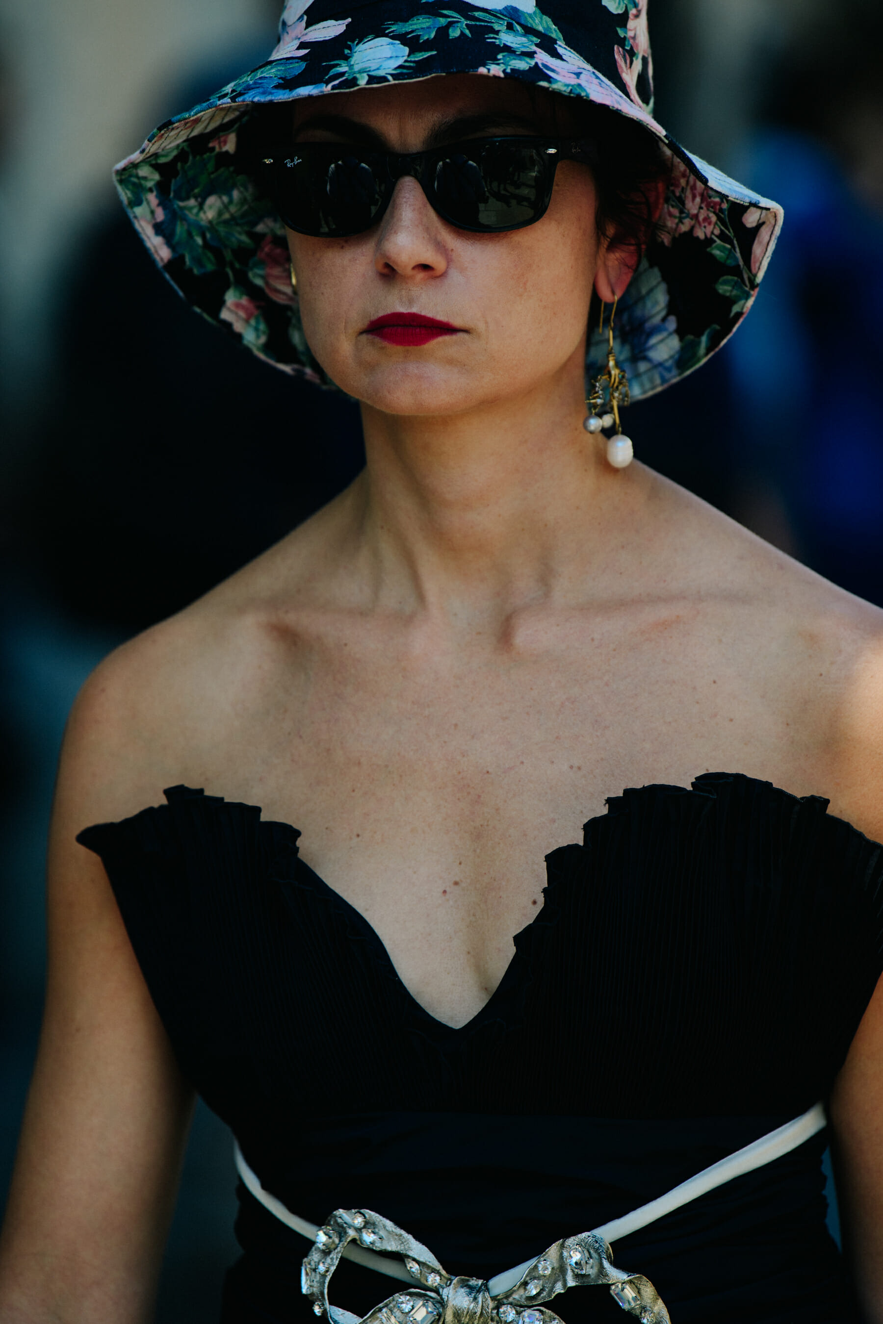 Woman wearing floral bucket hat