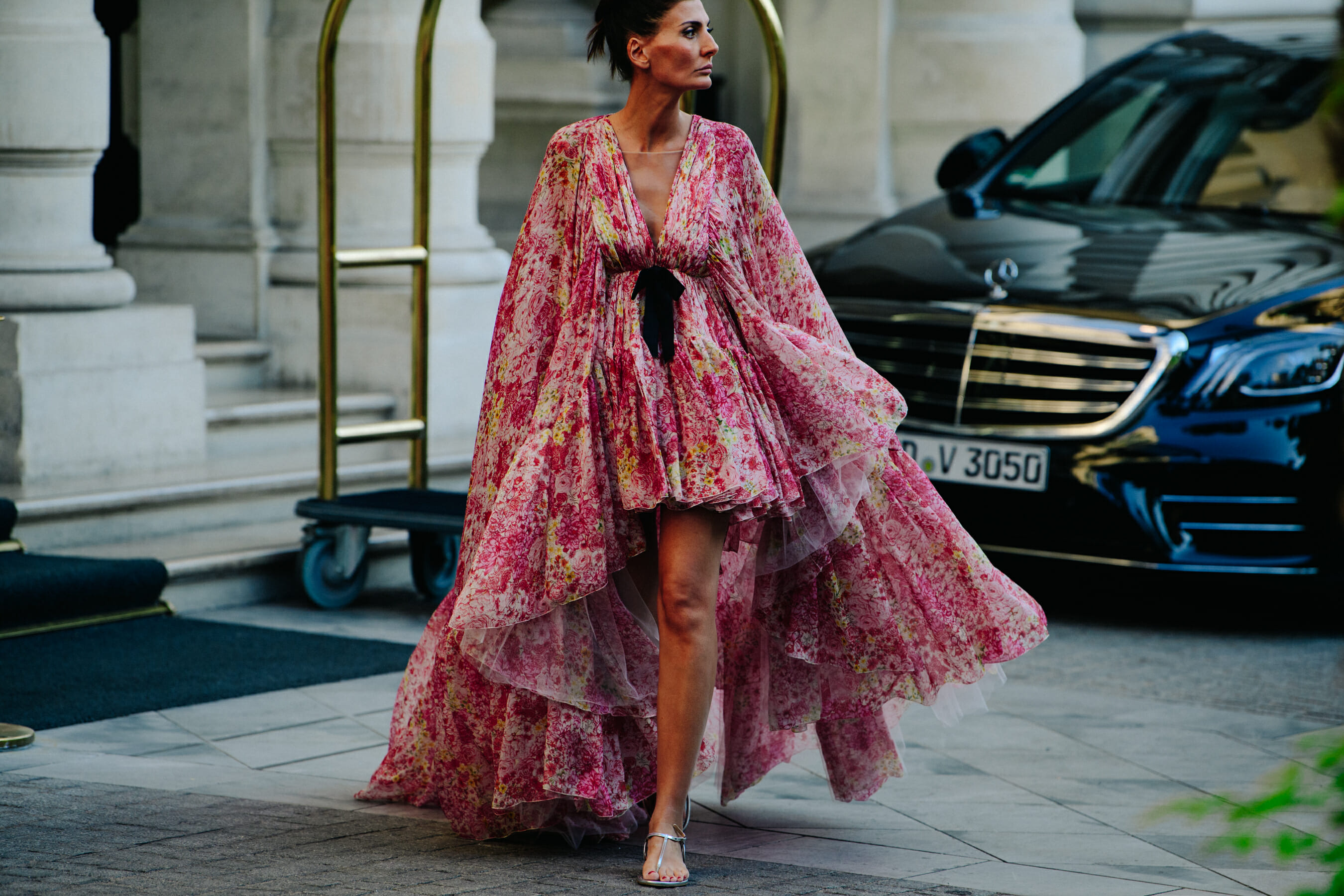 Woman wearing large pink dress