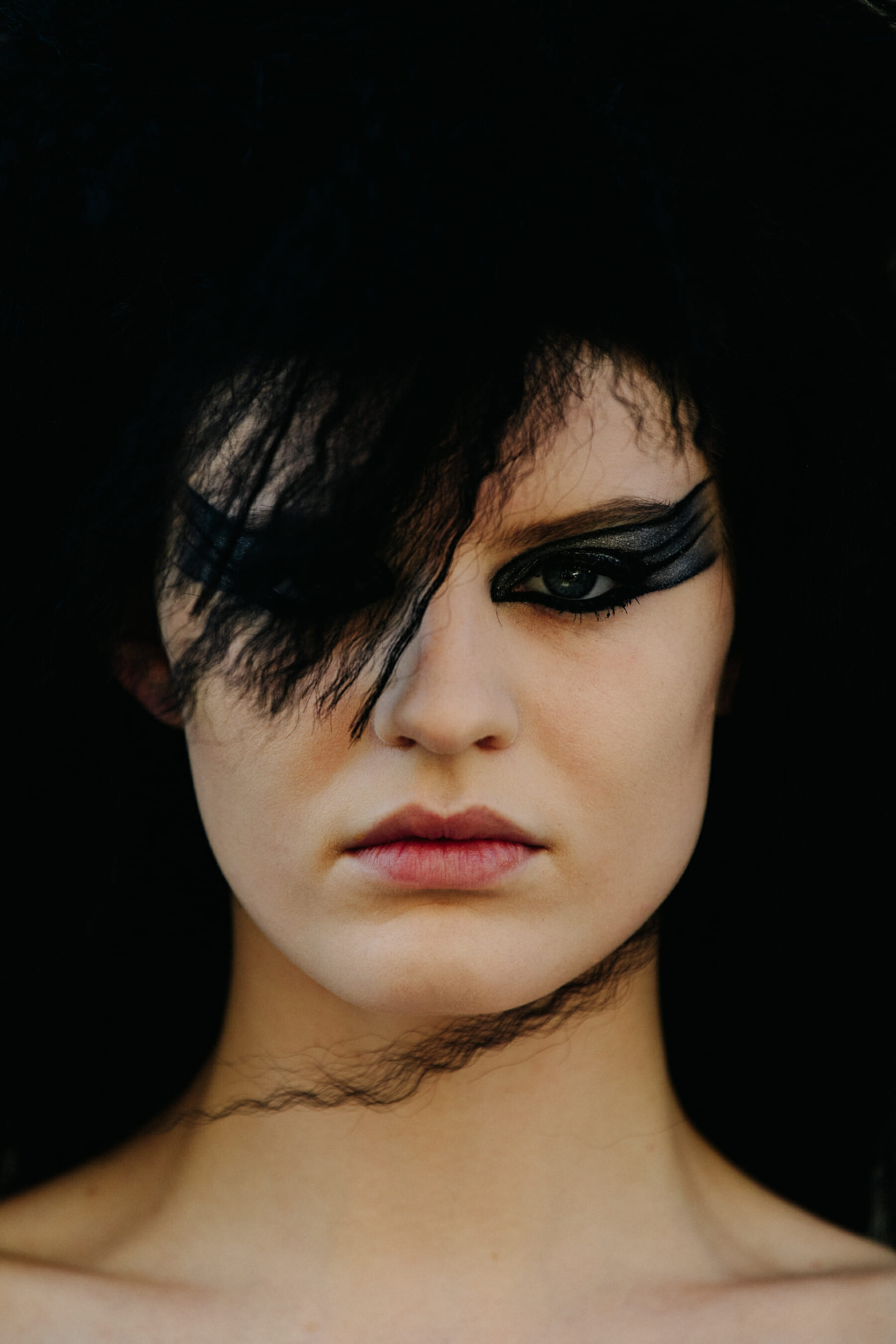 Portrait of model with large crimped hair