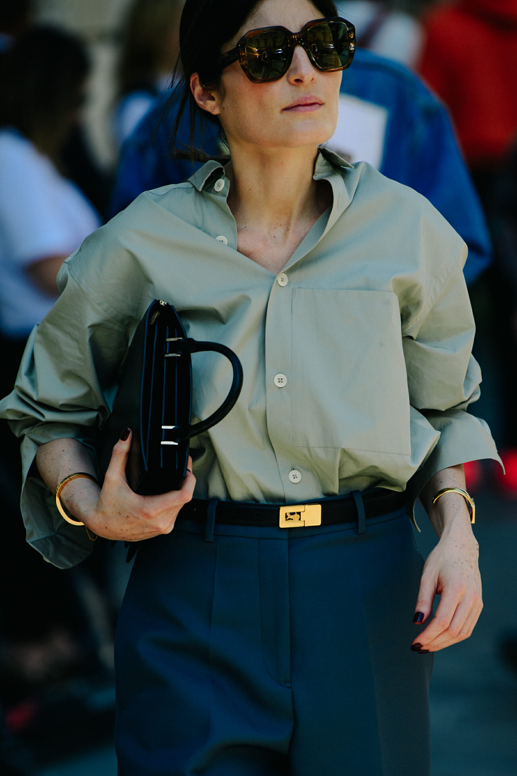 Woman wearing light green shirt