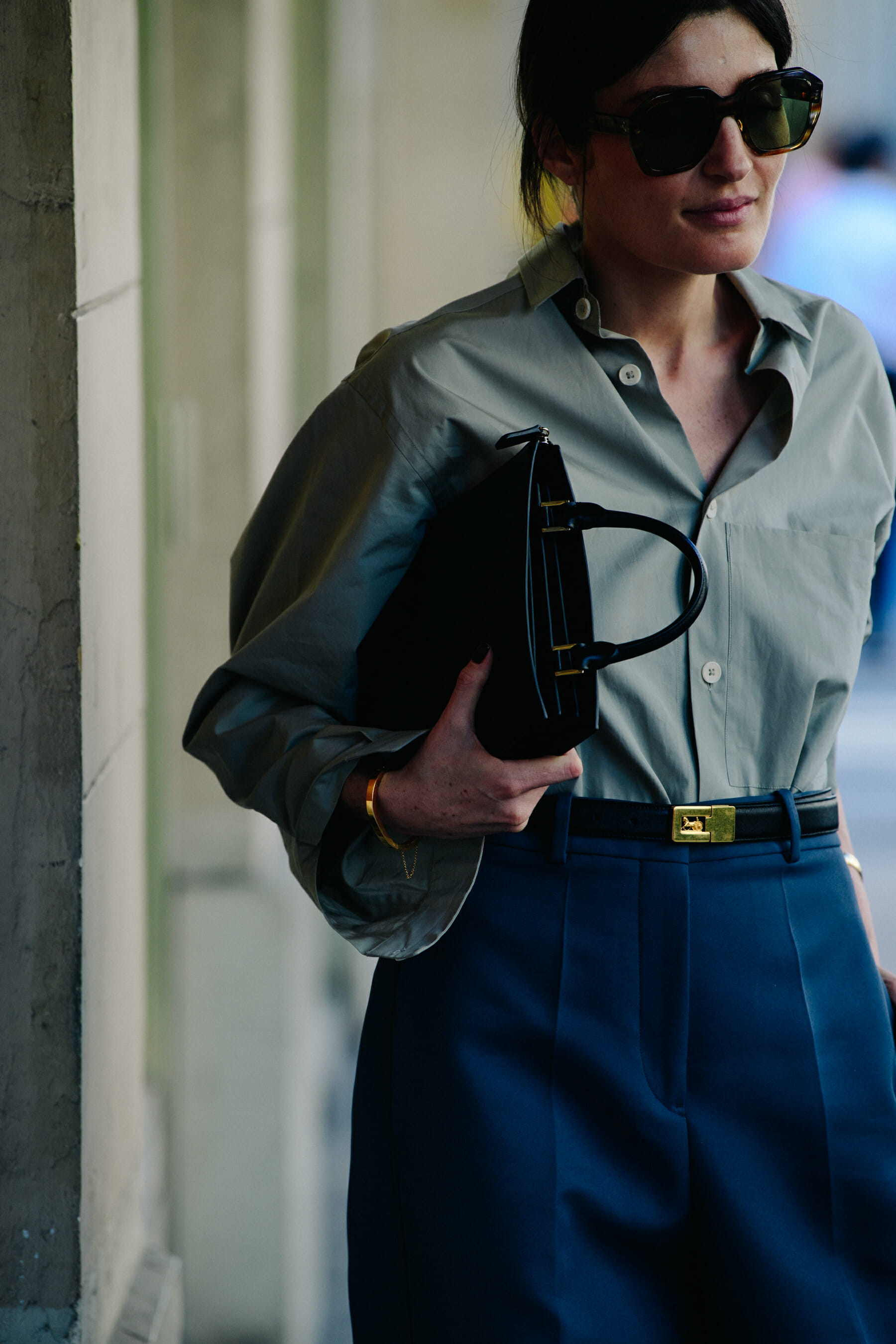 Woman wearing navy pants