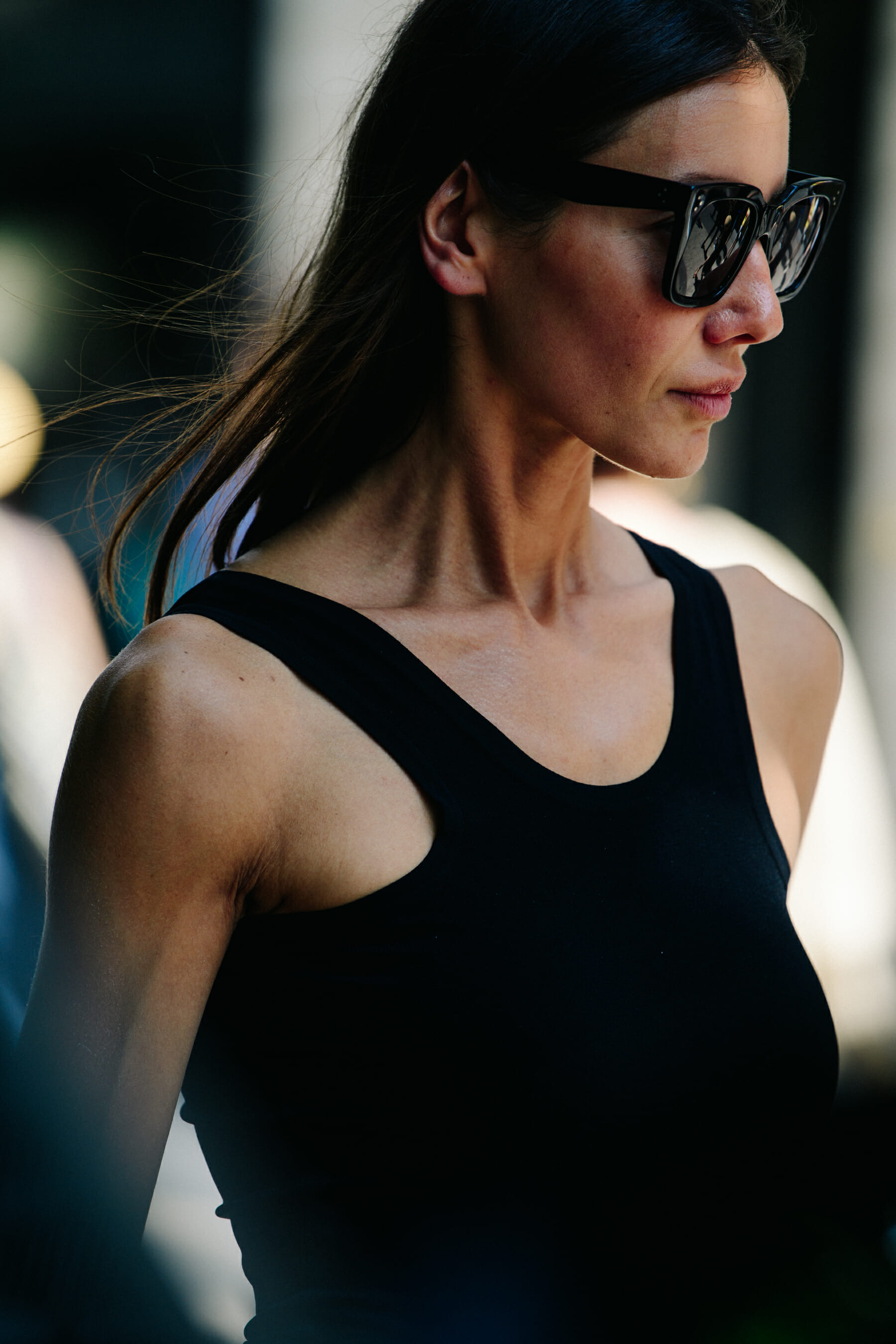 Woman wearing large black glasses