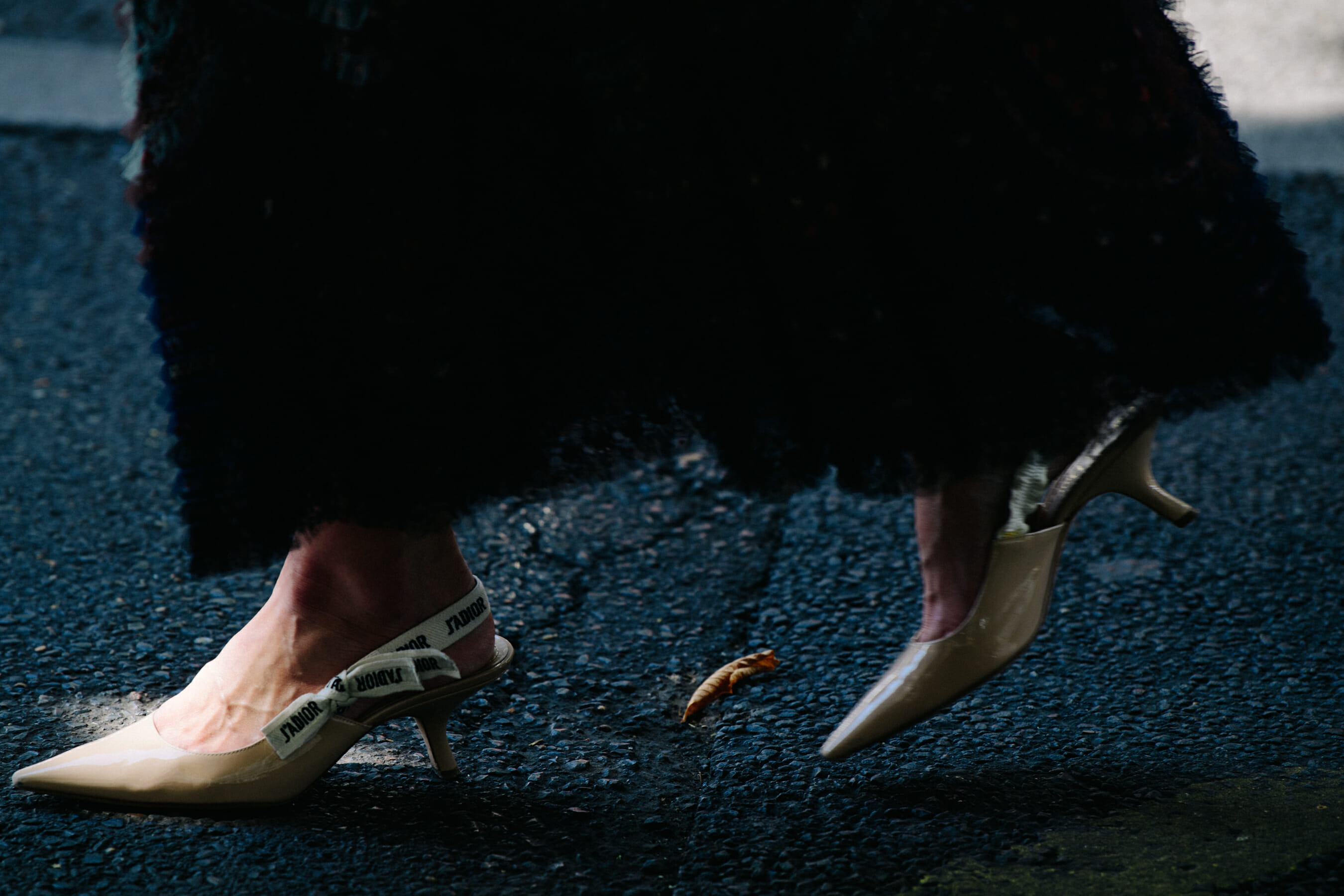Woman wearing Christian Dior shoes