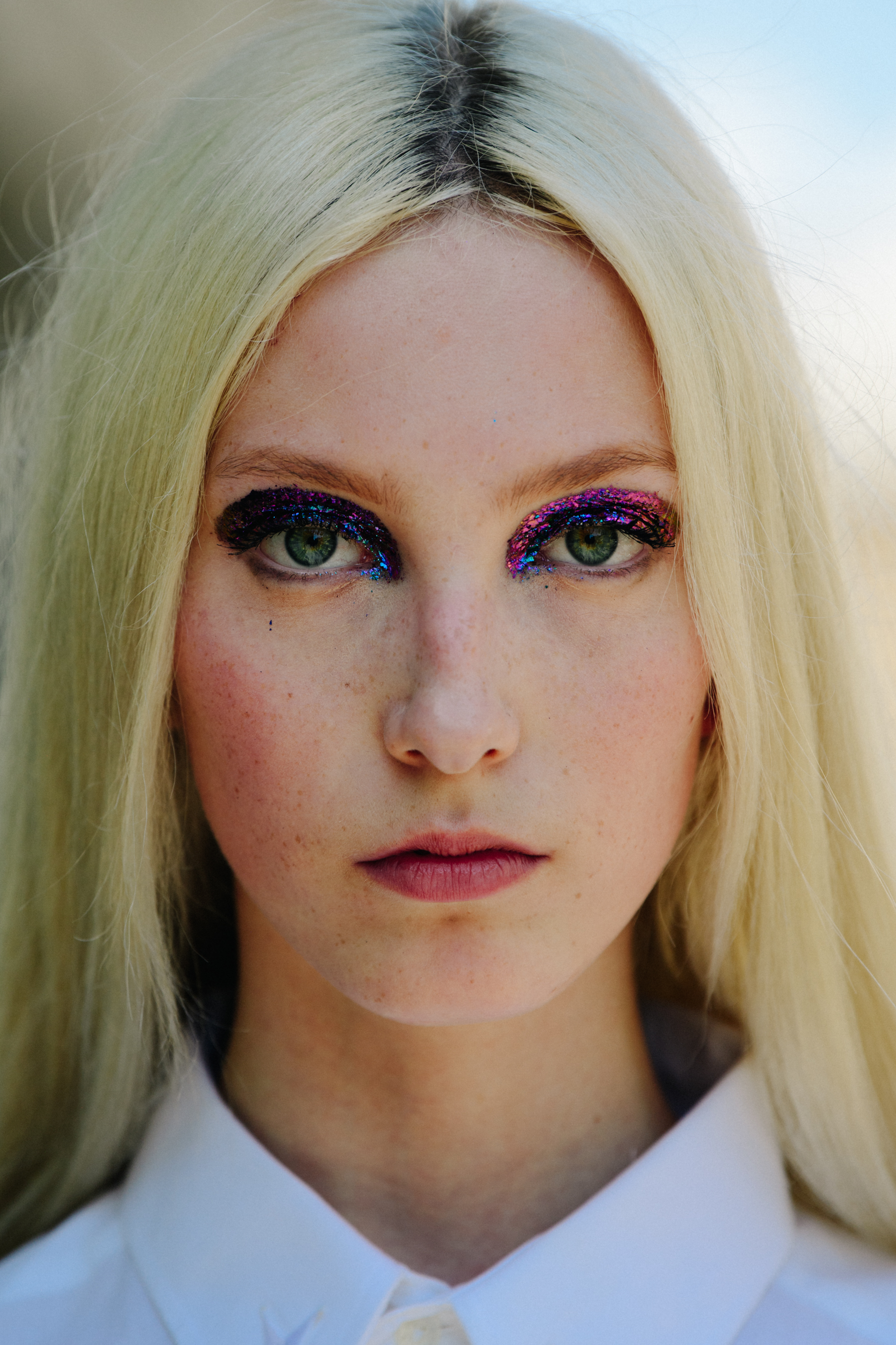 Portrait of model wearing glitter makeup