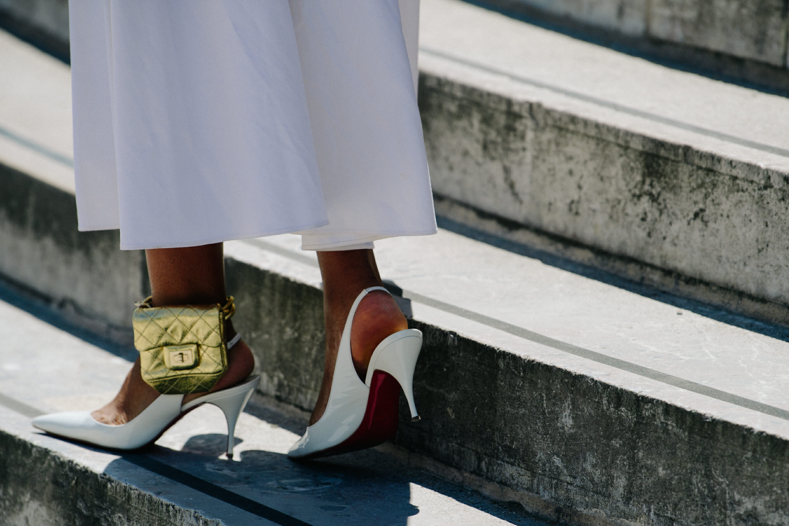 Woman wearing Louboutin heels