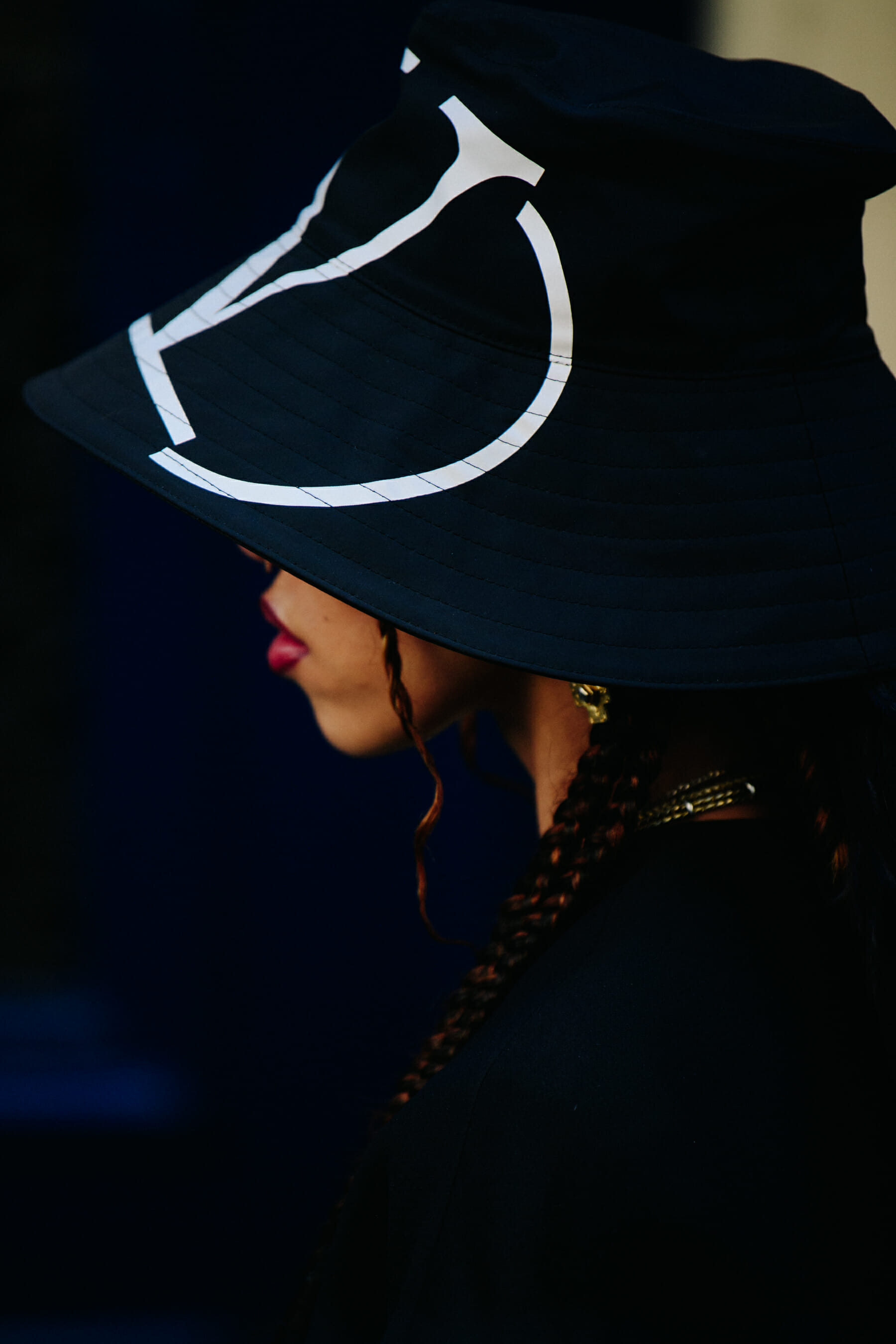Woman wearing black hat