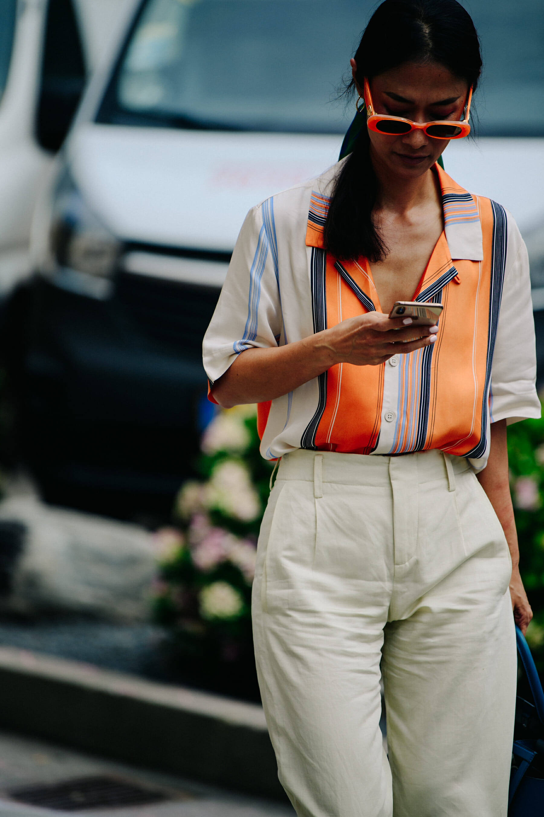 Woman wearing orange glasses