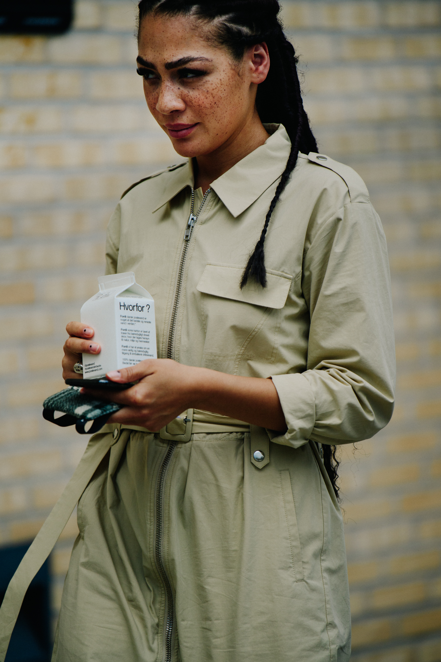 Woman wearing tan jumpsuit