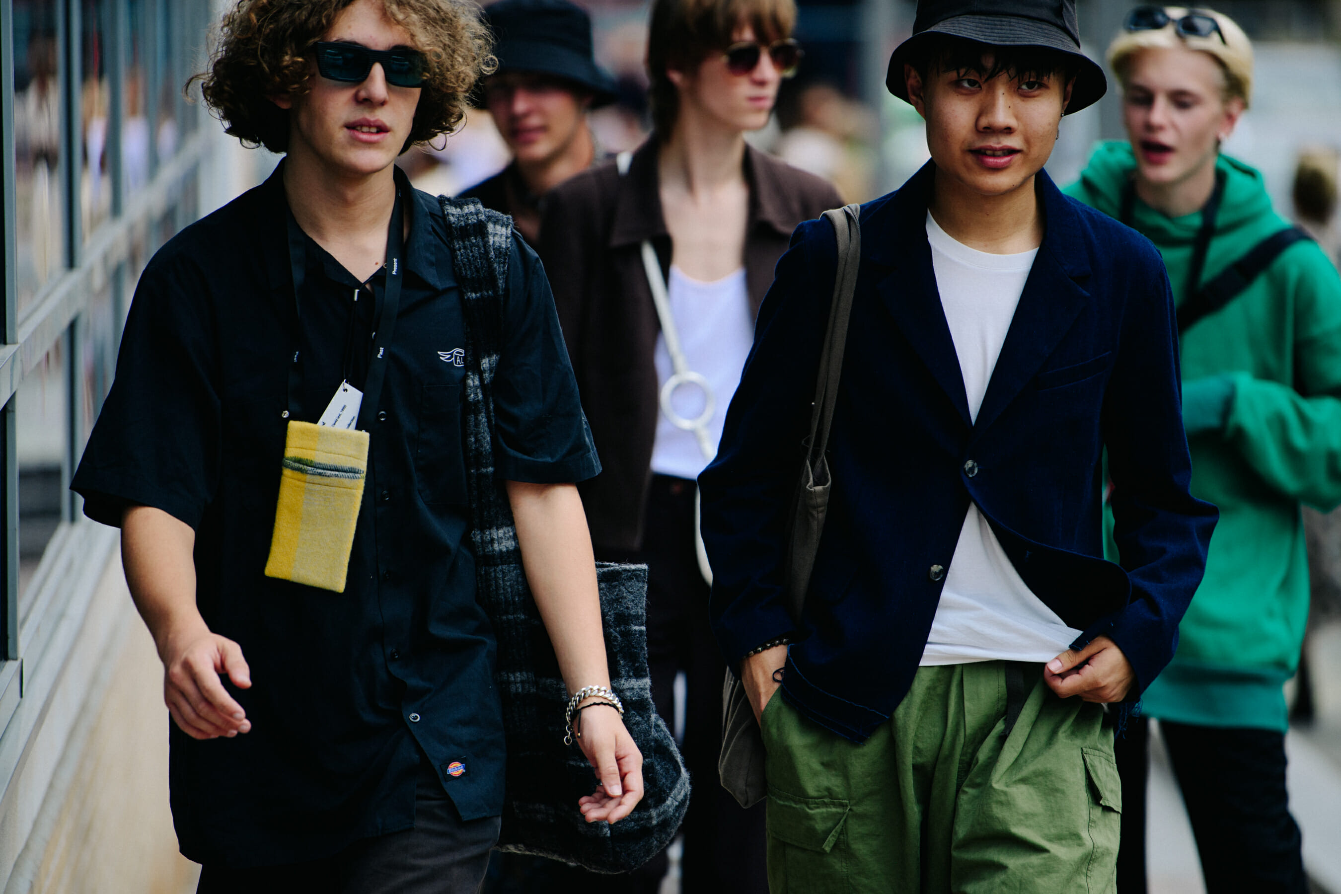 Two men wearing dark clothing