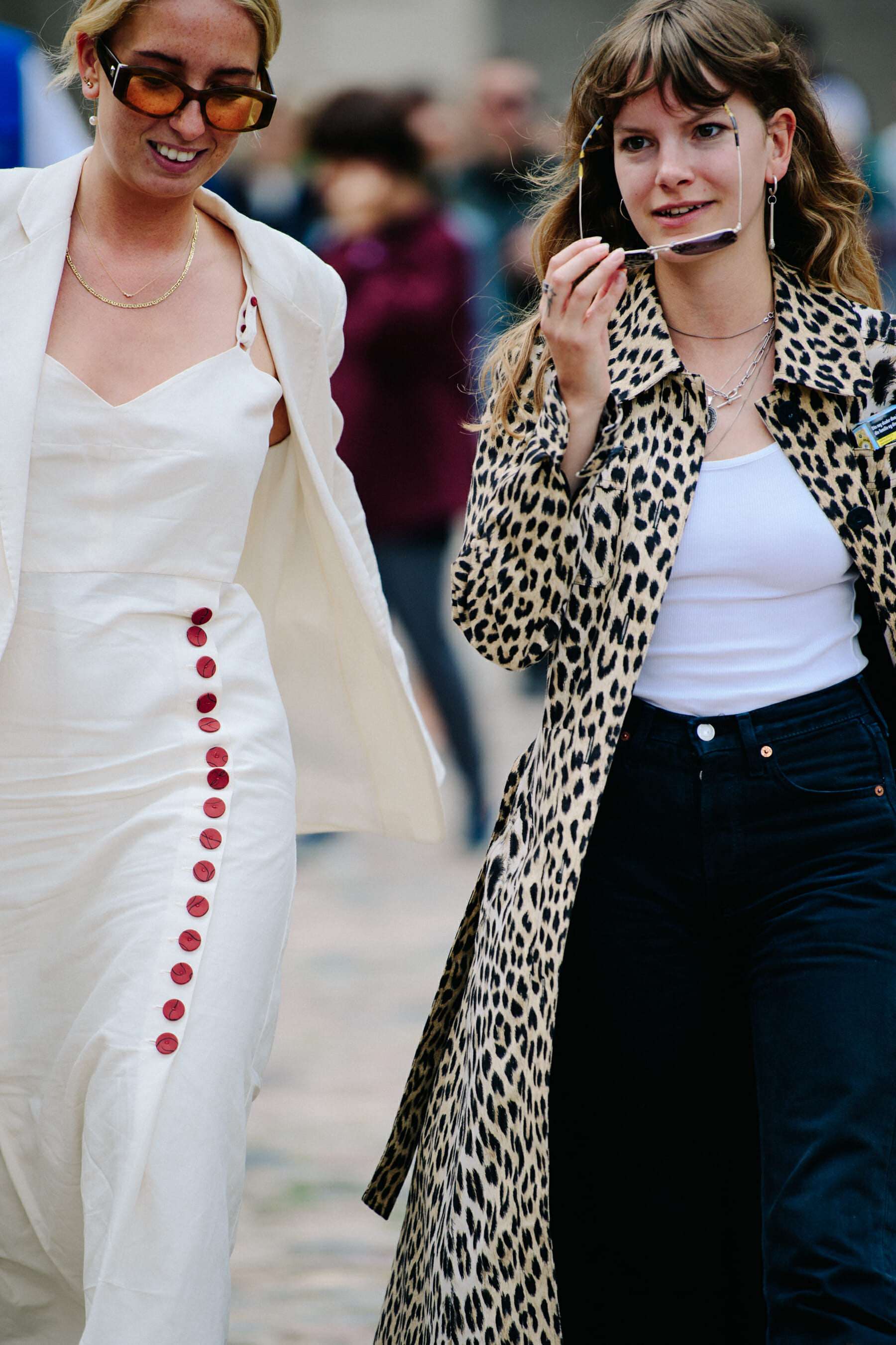 Two women wearing long outfits