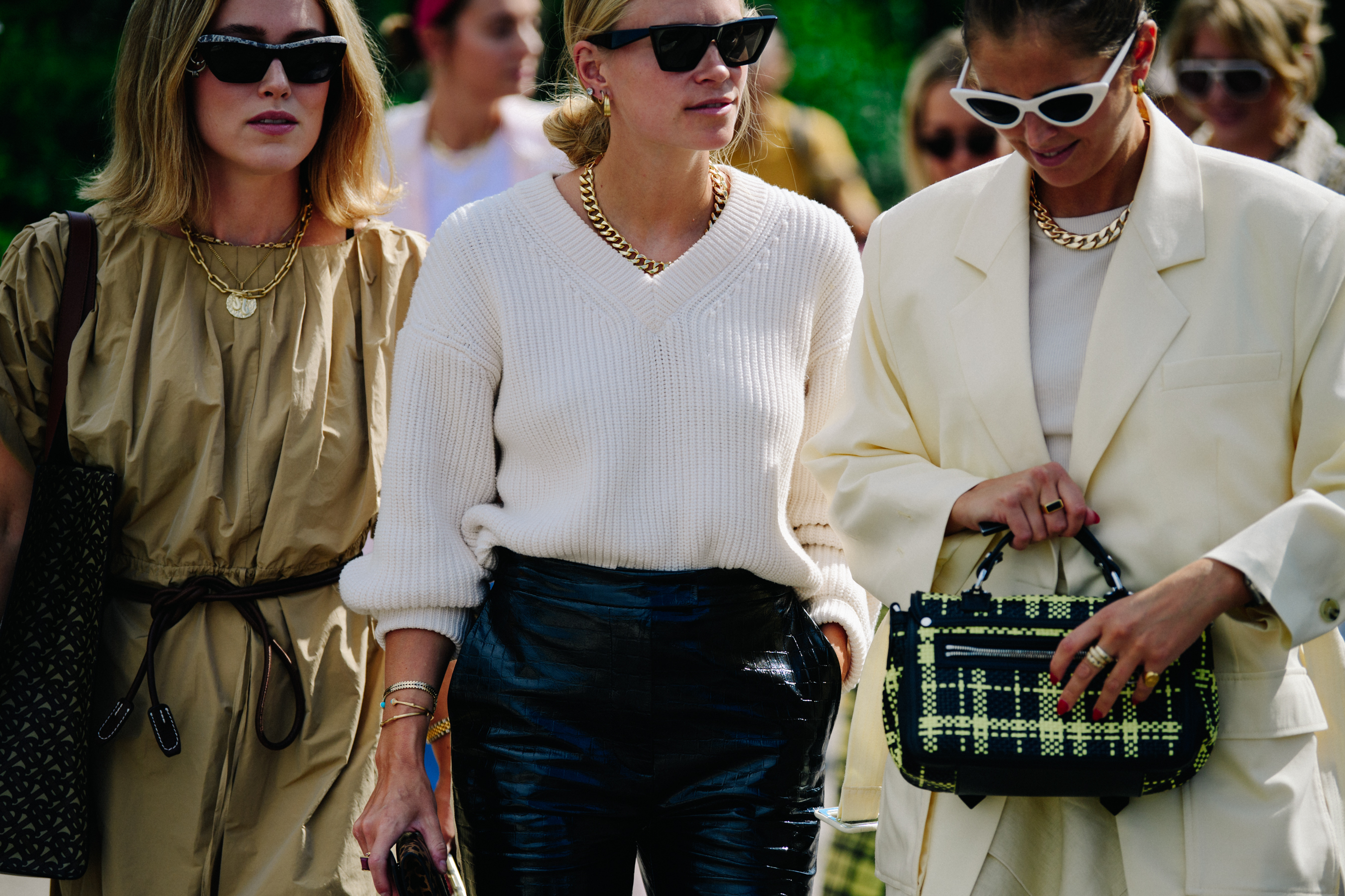 Three bloggers wearing light colours