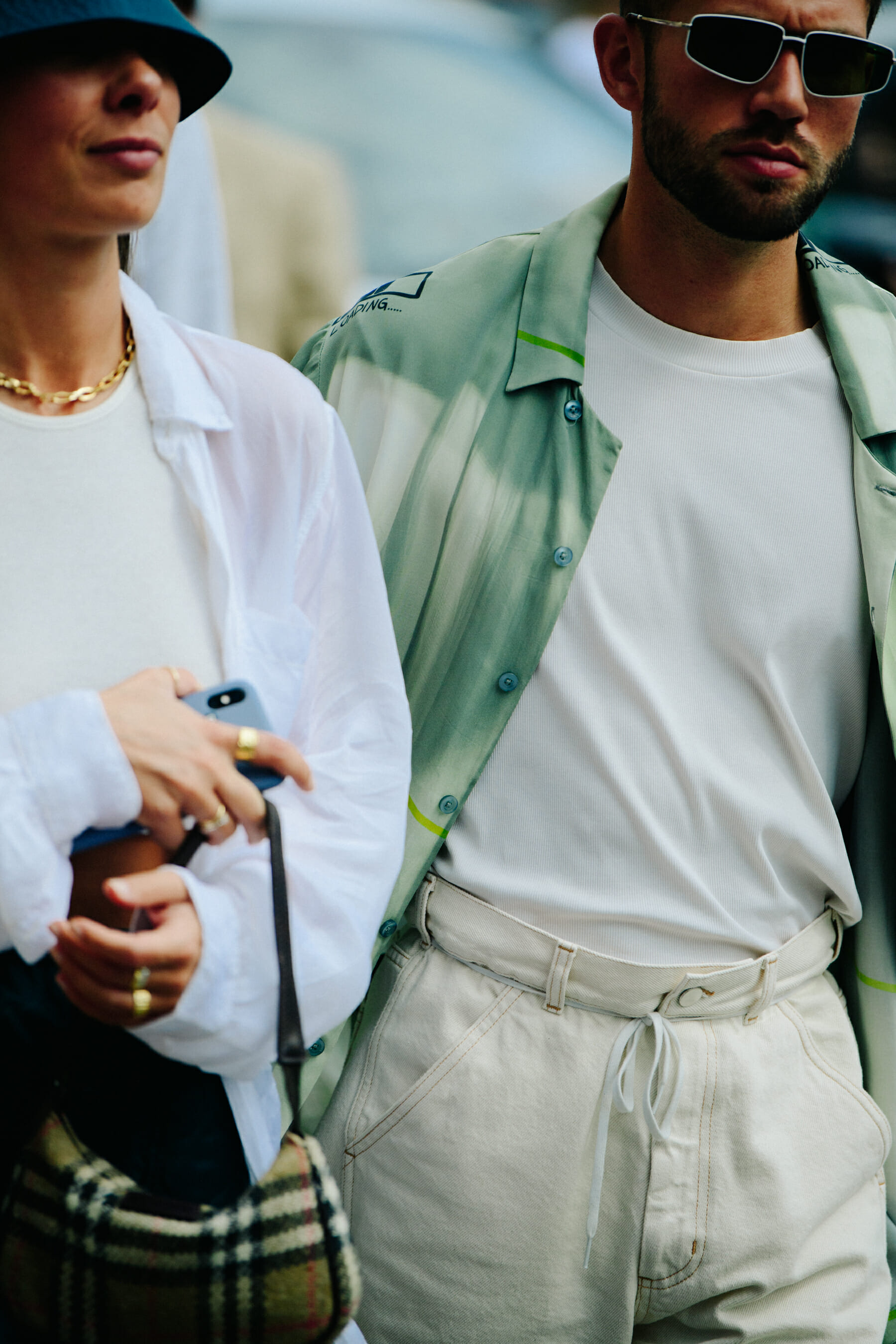 Couple wearing light outfits