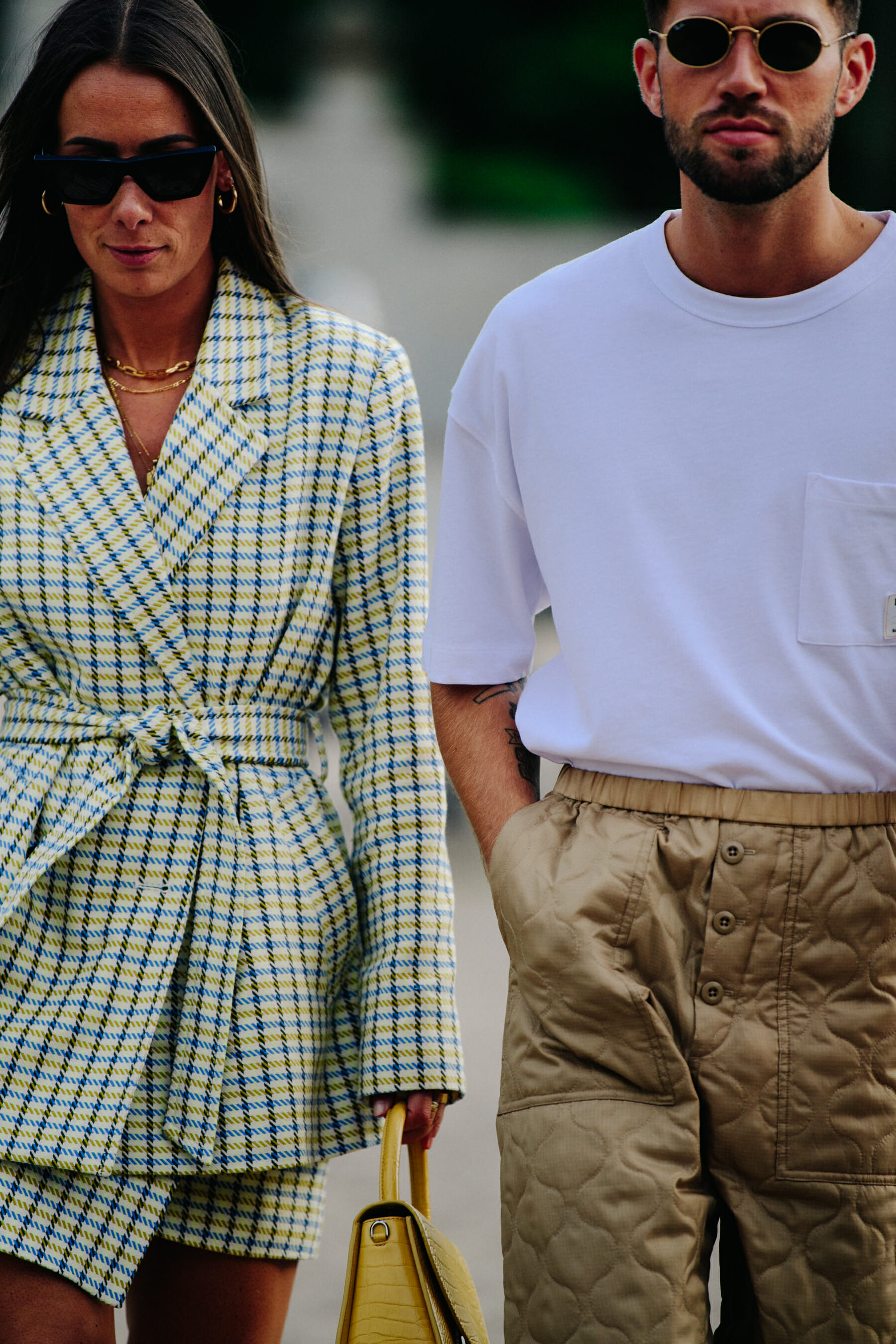 Couple wearing light outfits