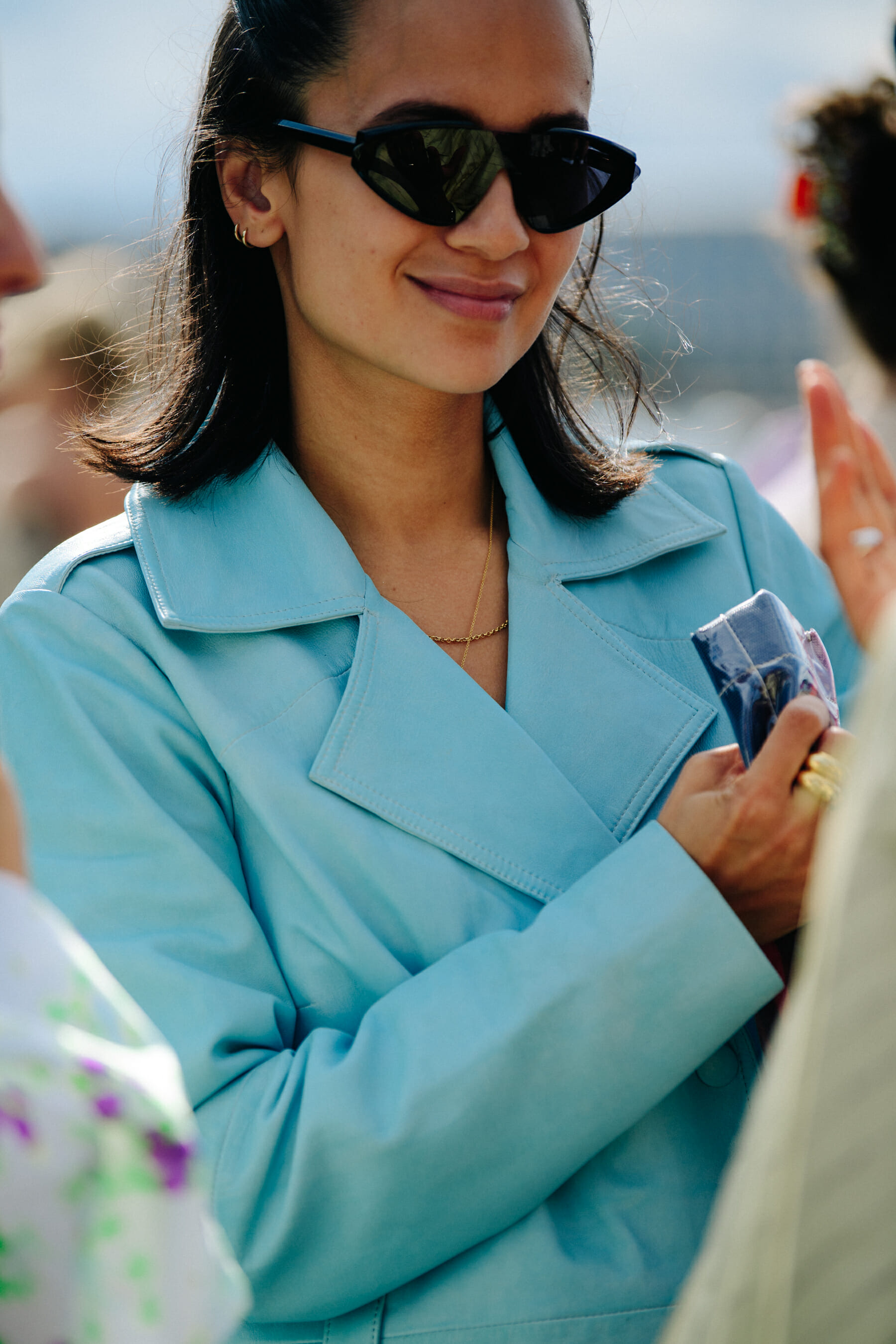 Woman wearing blue jacket