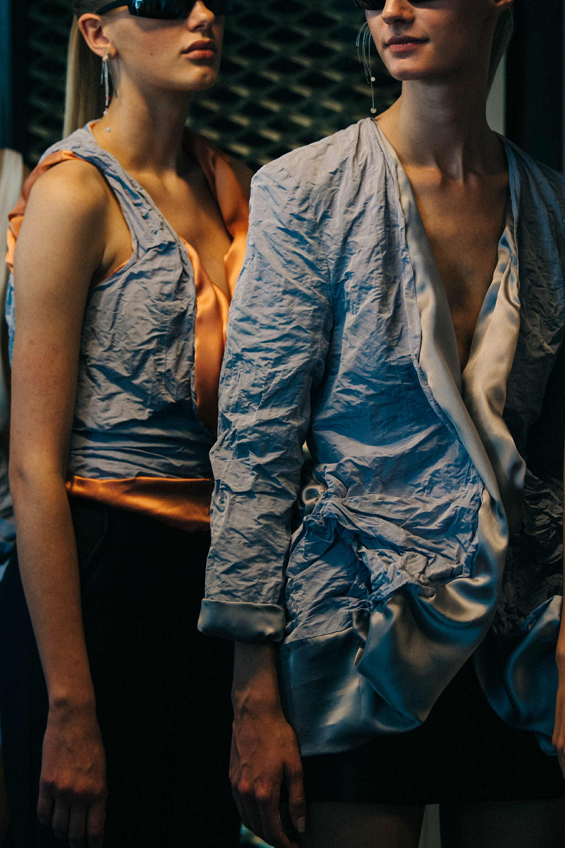Model wearing dark sunglasses