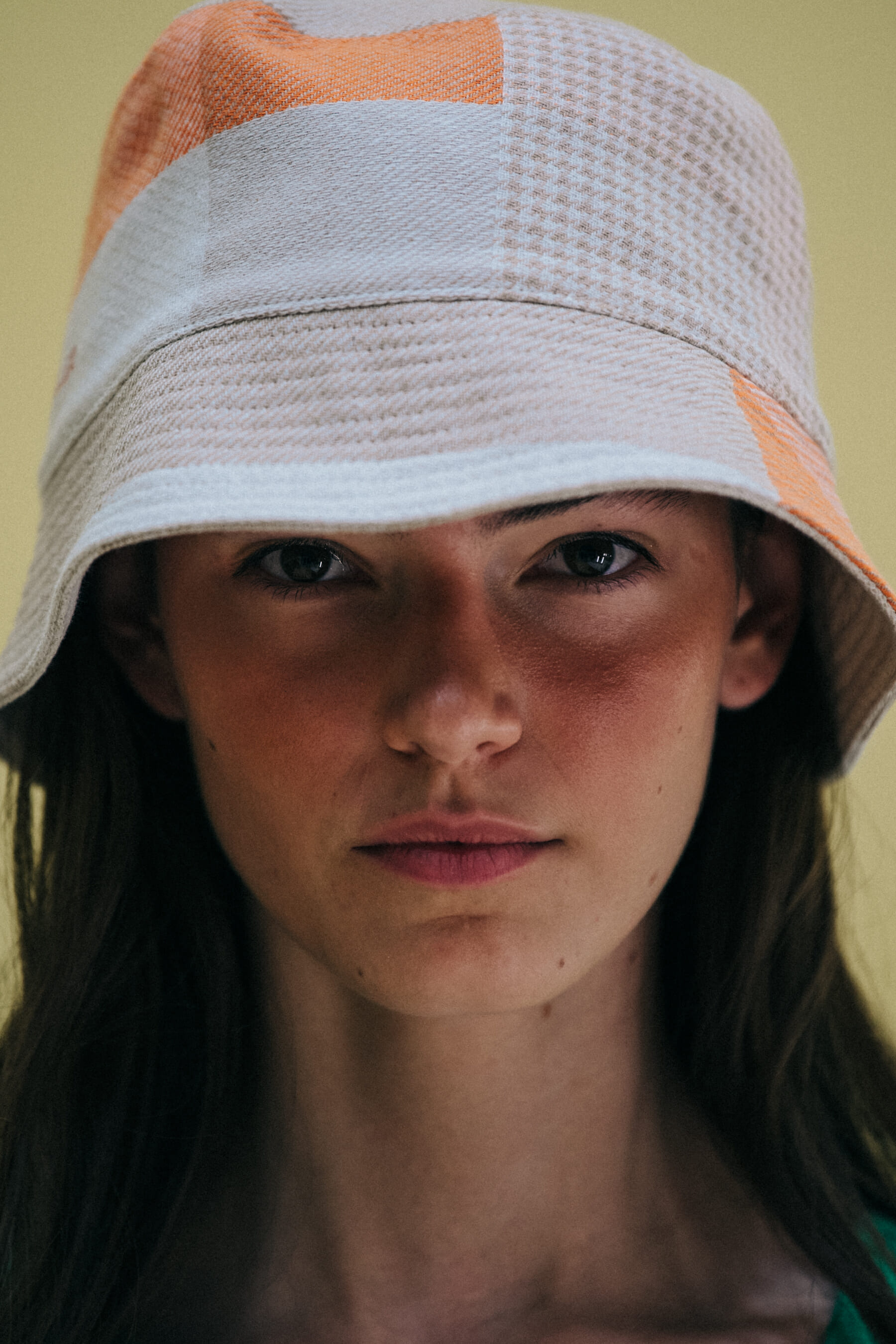 Portrait of model wearing hat at Holzweiler