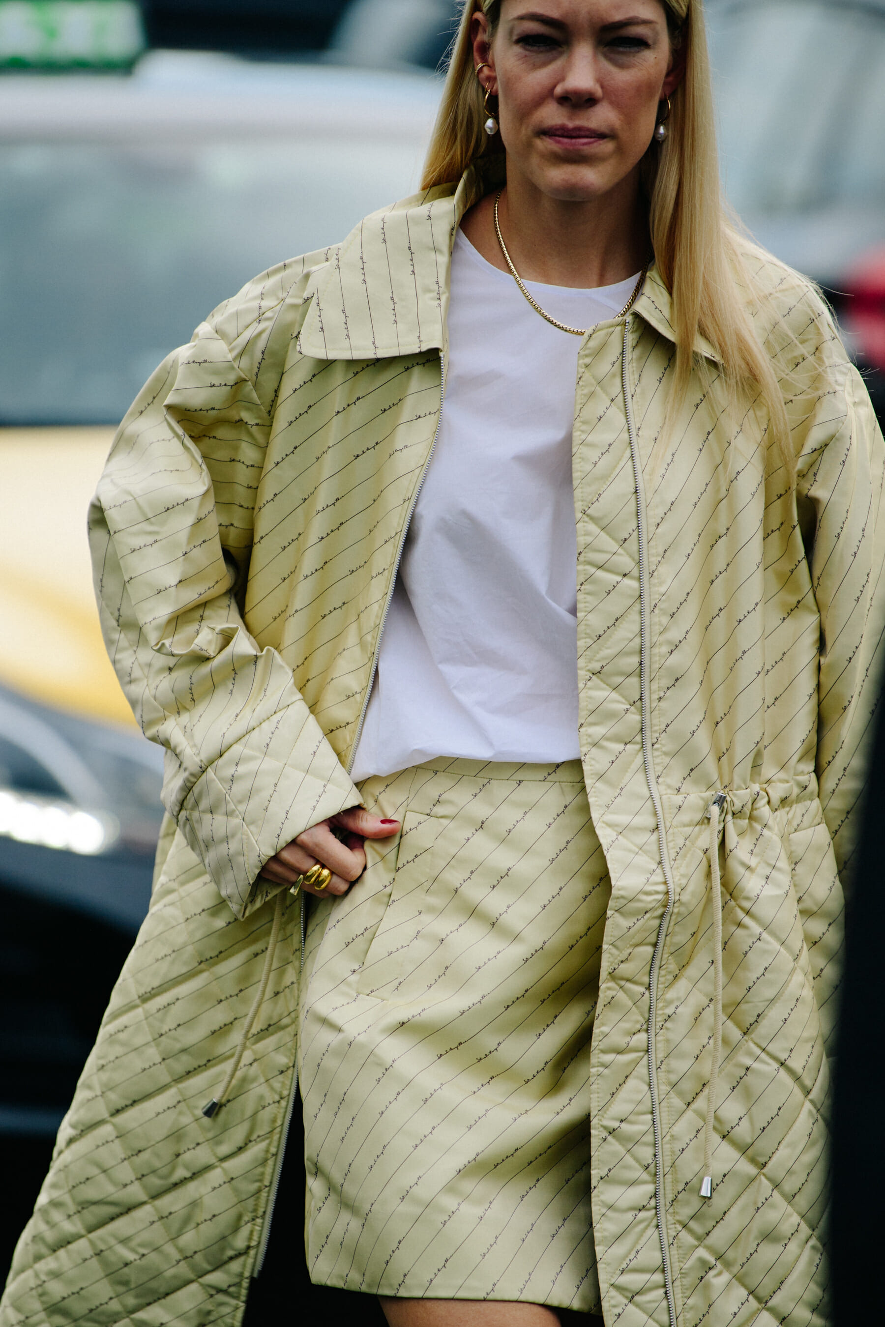 Woman wearing yellow jacket