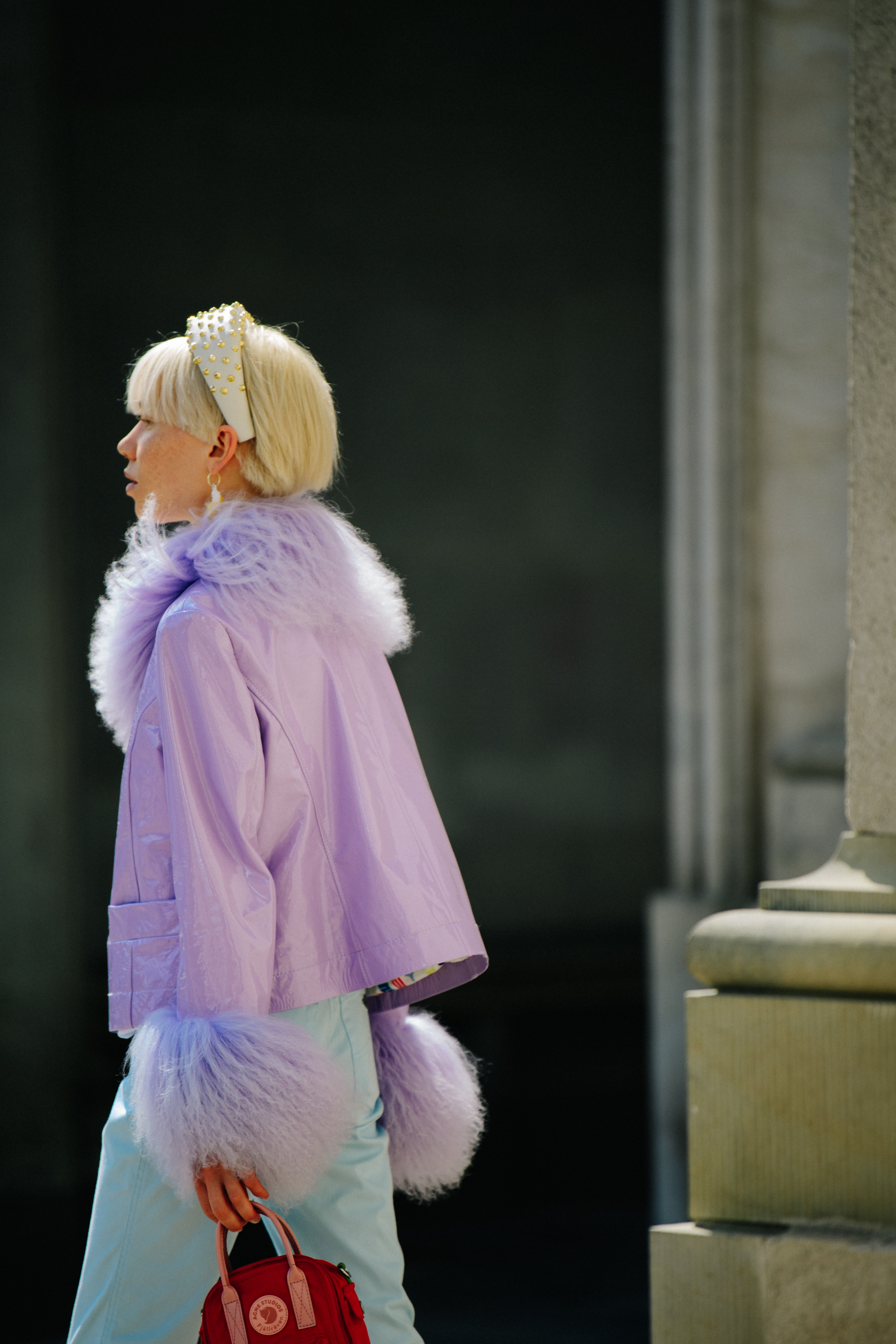 Woman wearing purple jacket