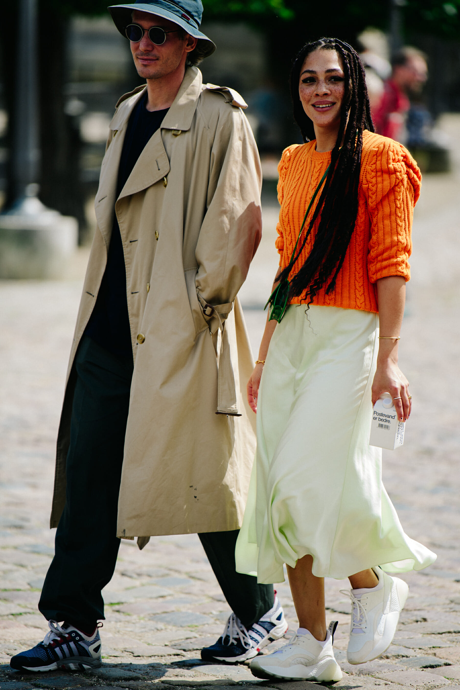 Woman wearing orange jumper
