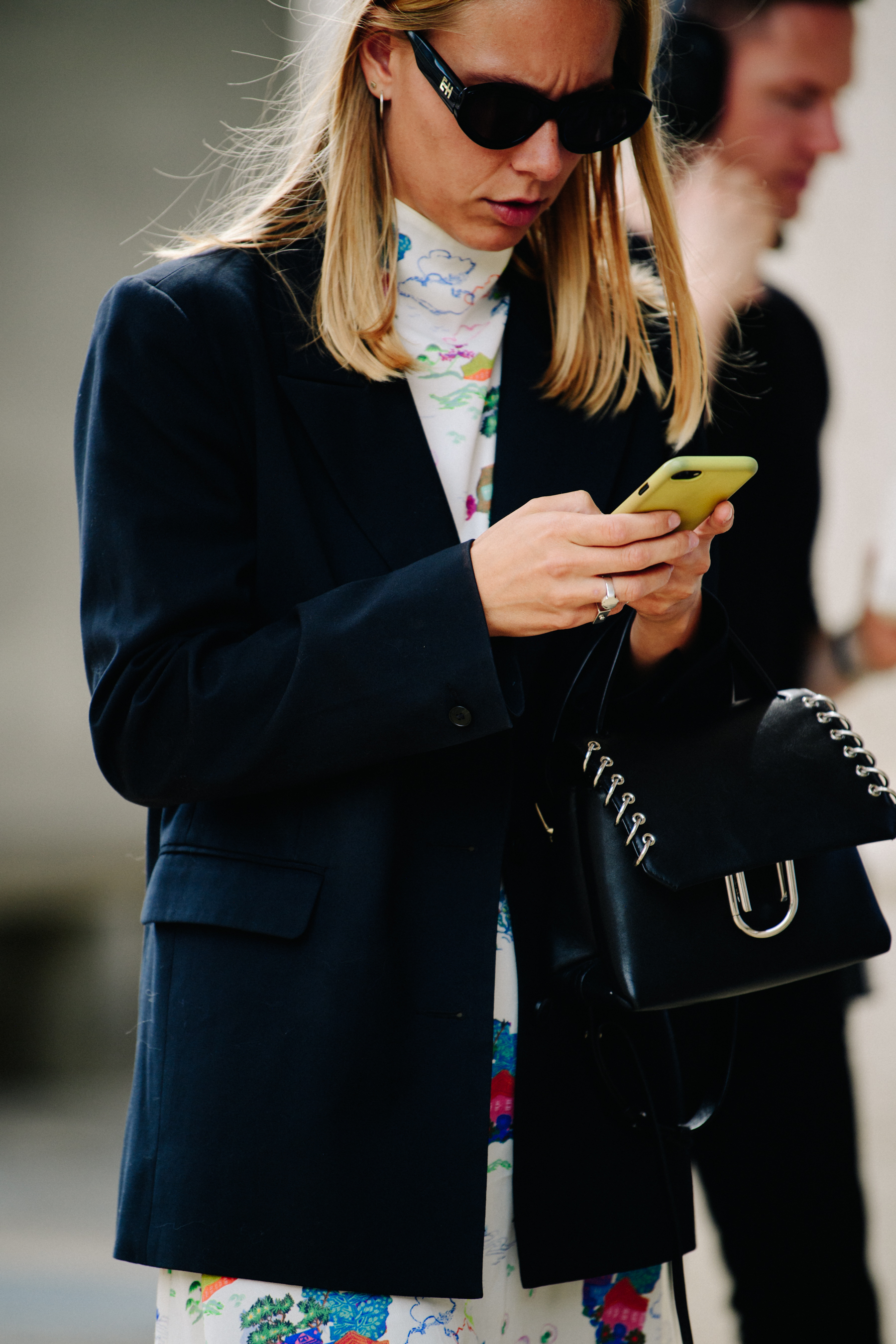 Woman wearing dark blazer