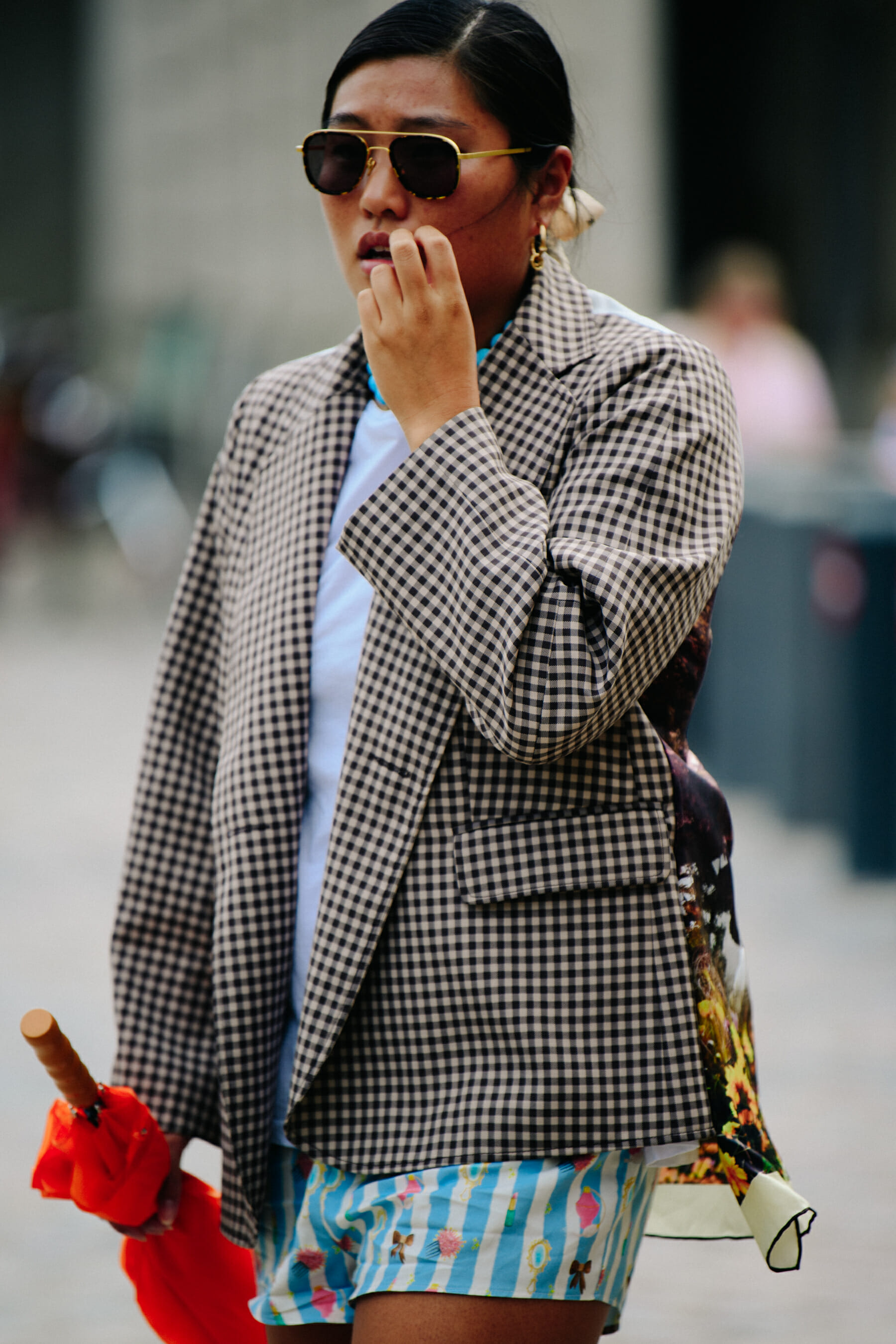 Woman wearing check jacket