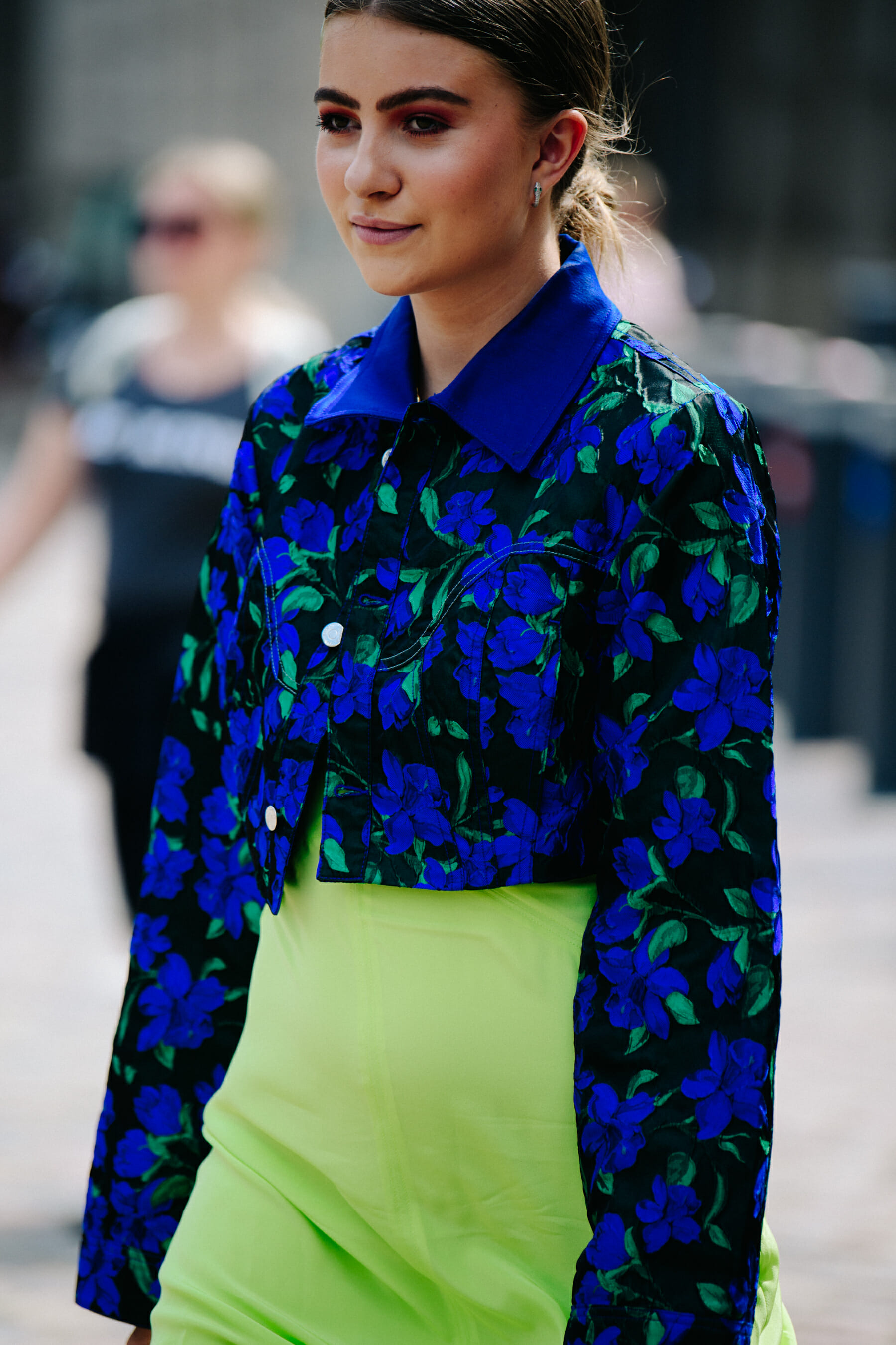 Woman wearing blue floral jacket