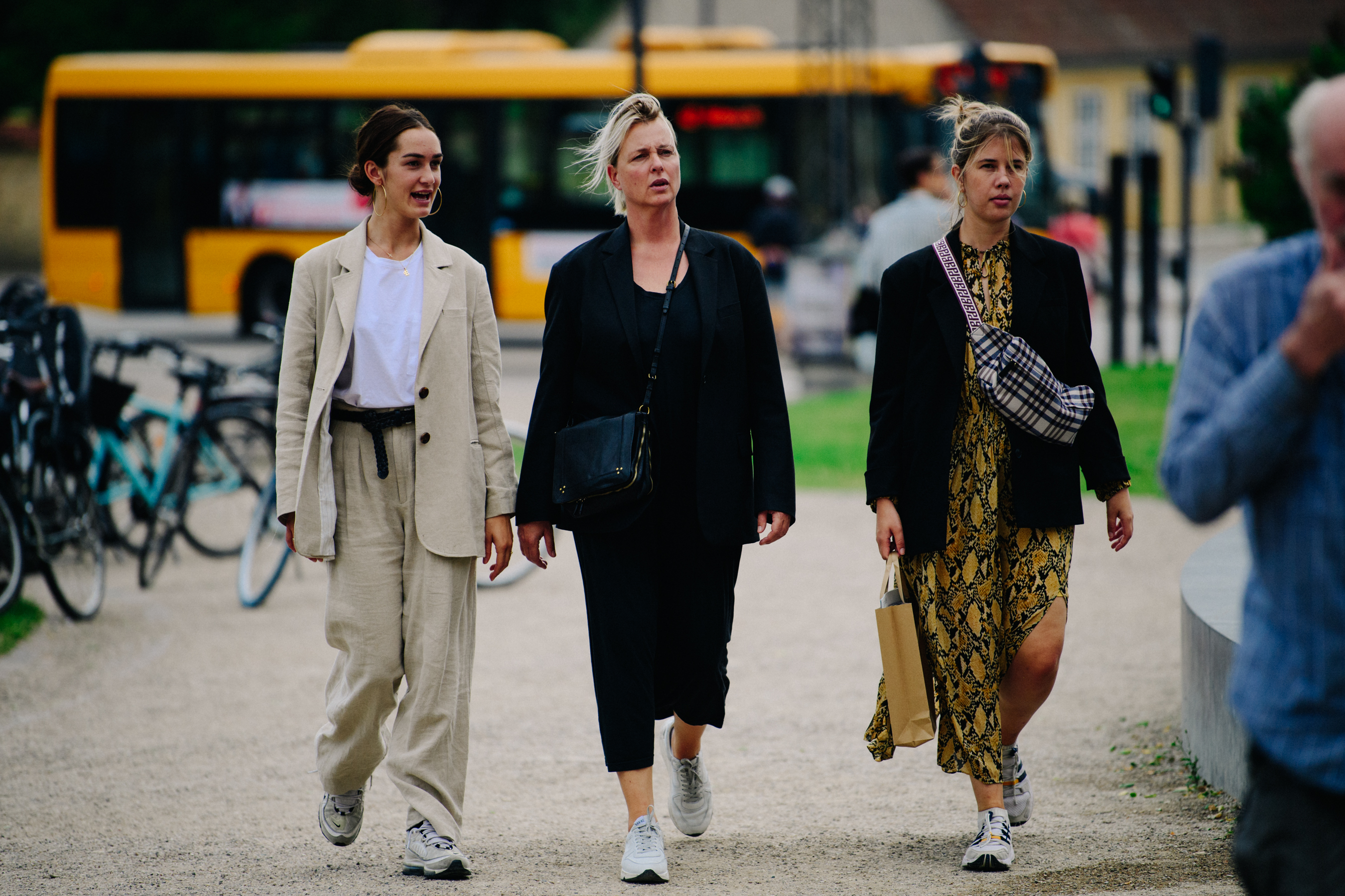 Women wearing white sneakers