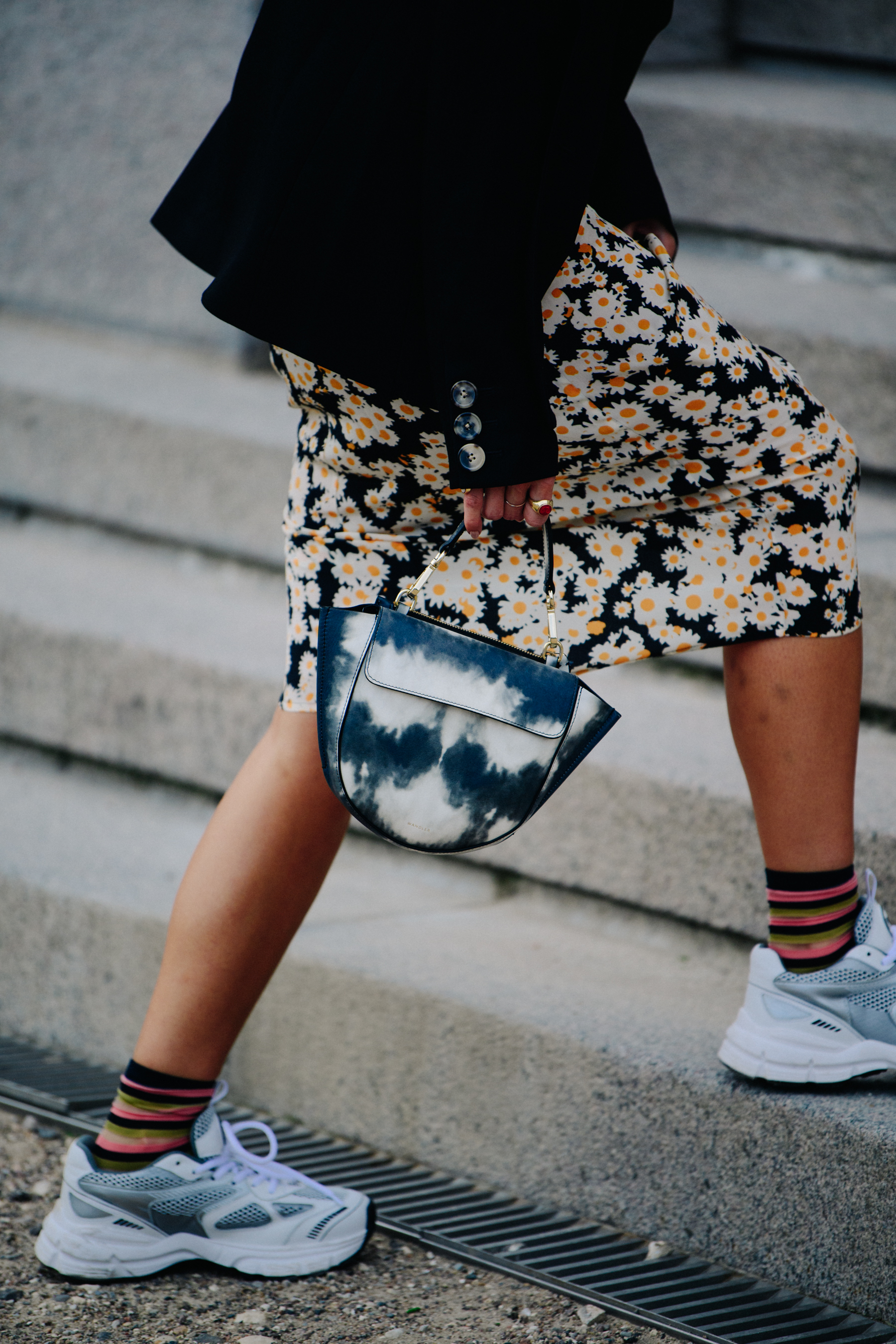Woman wearing white sneakers