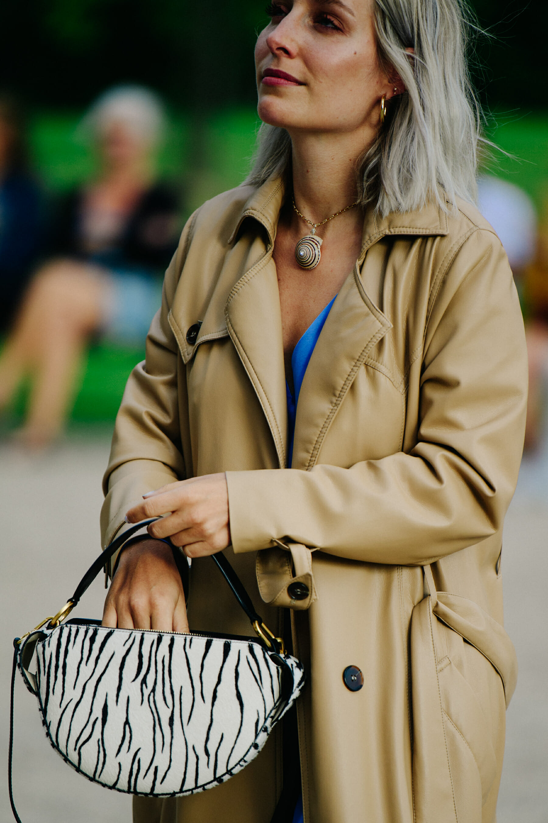 Woman wearing beige leather jacket