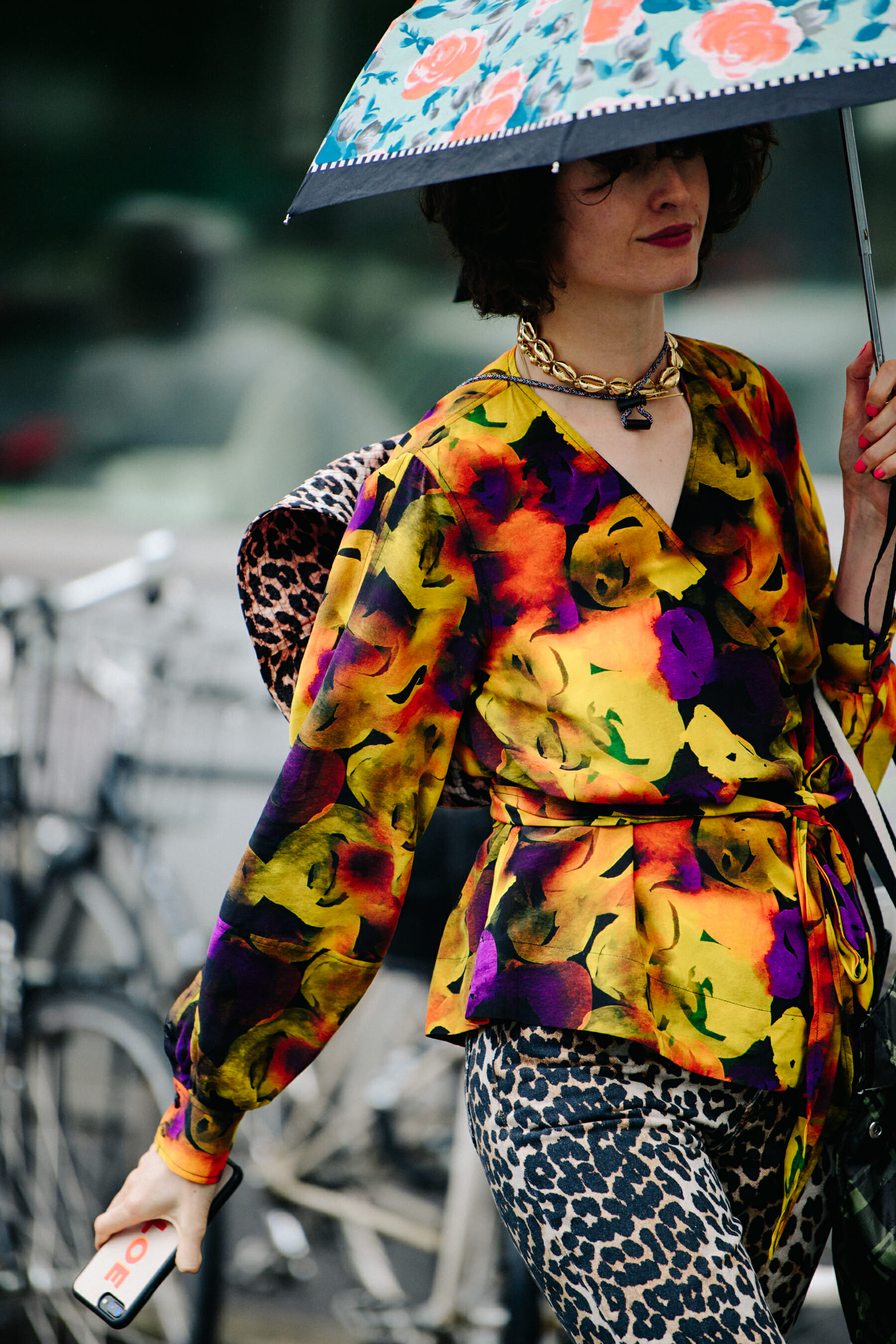 Woman carrying umbrella