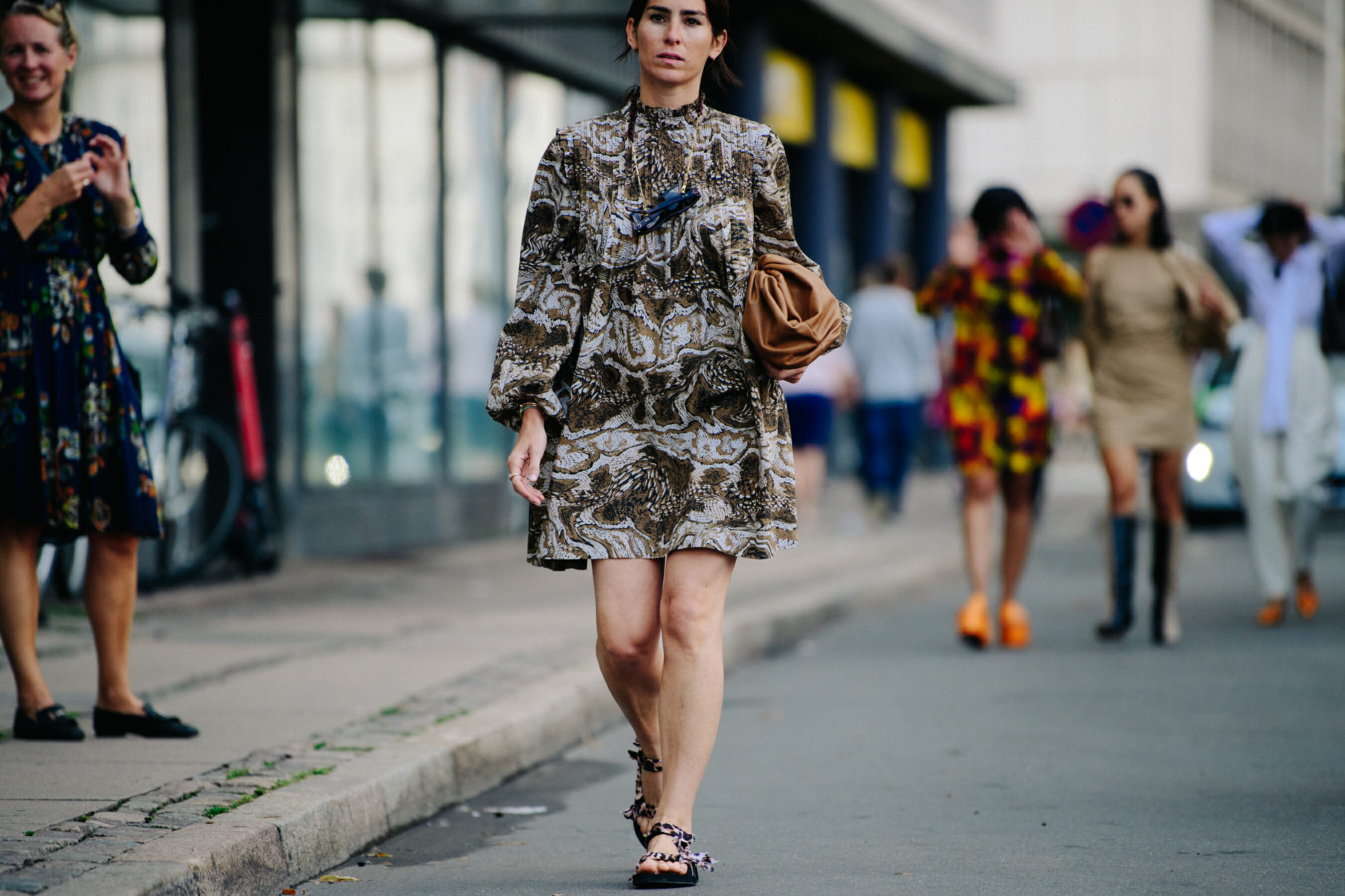 Woman wearing brown dress