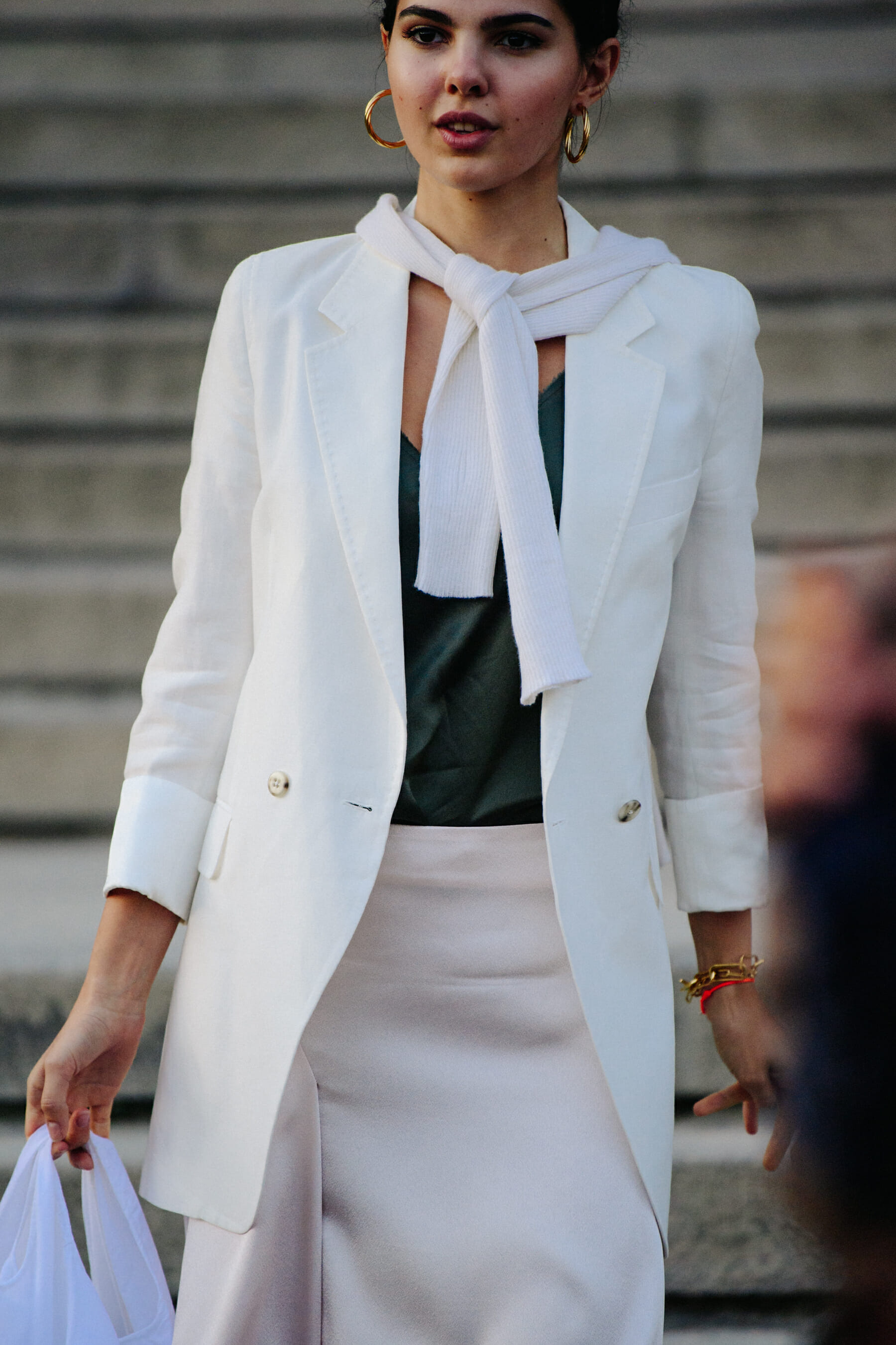 Woman wearing white jacket