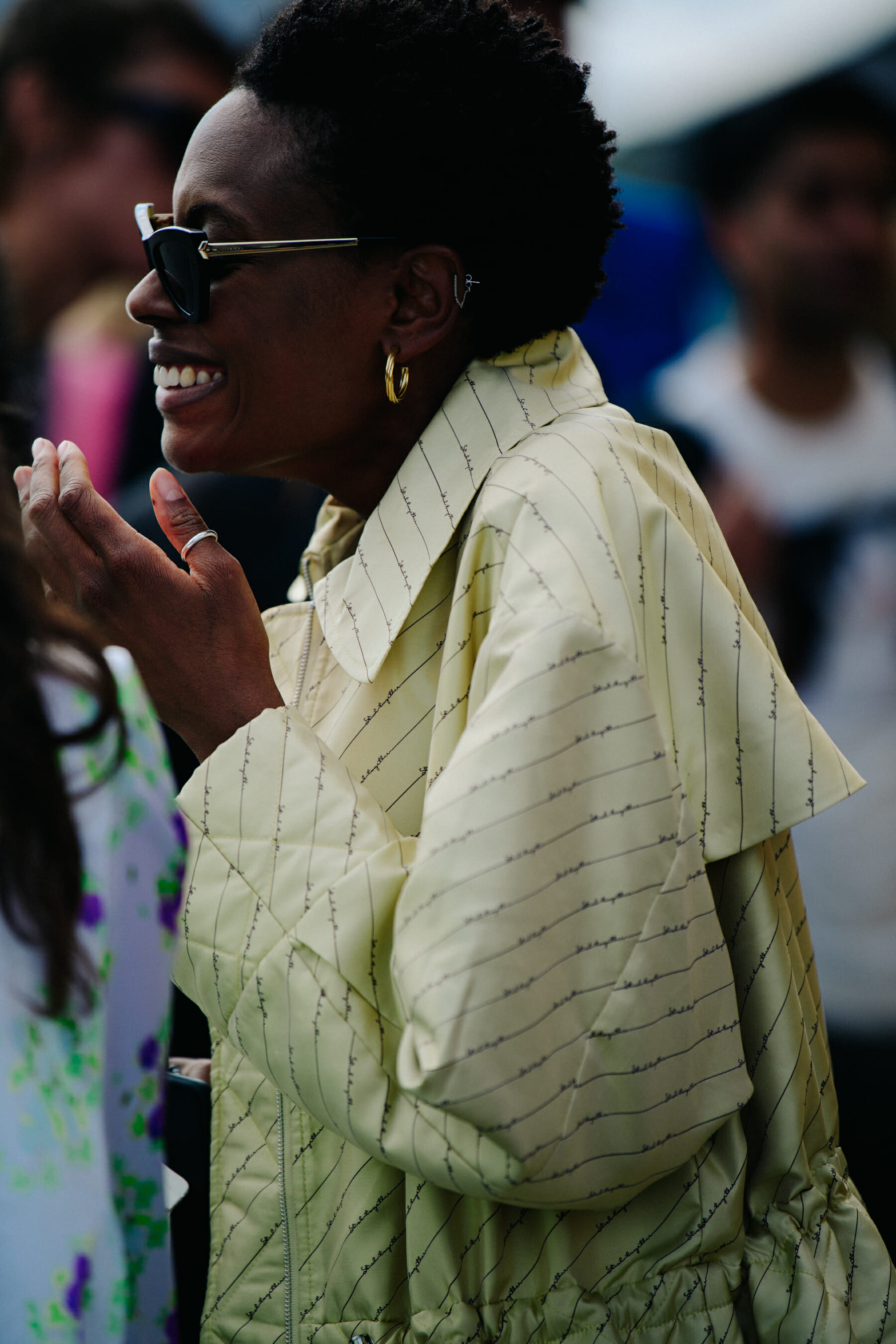 Woman wearing yellow jacket