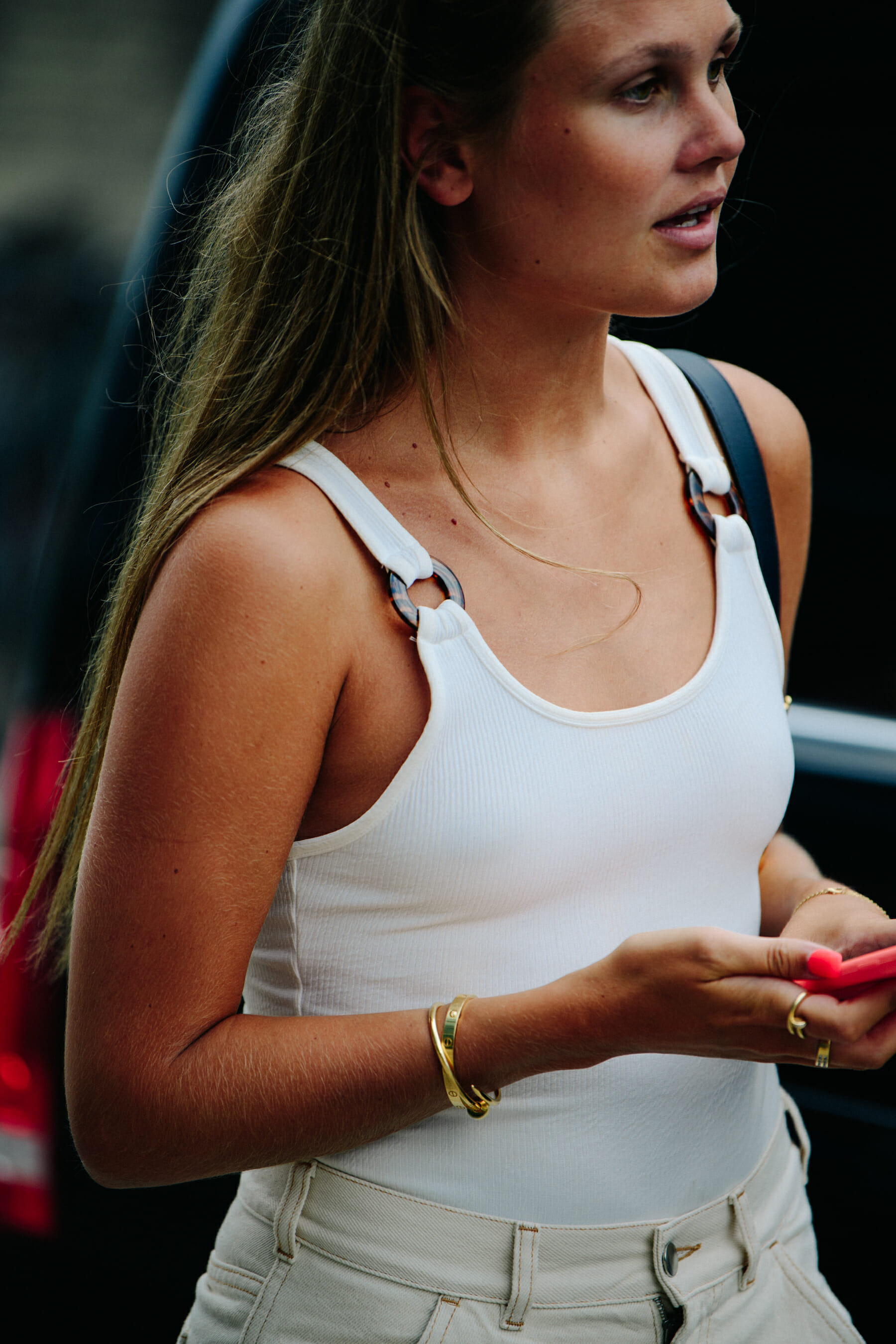 Woman wearing white vest