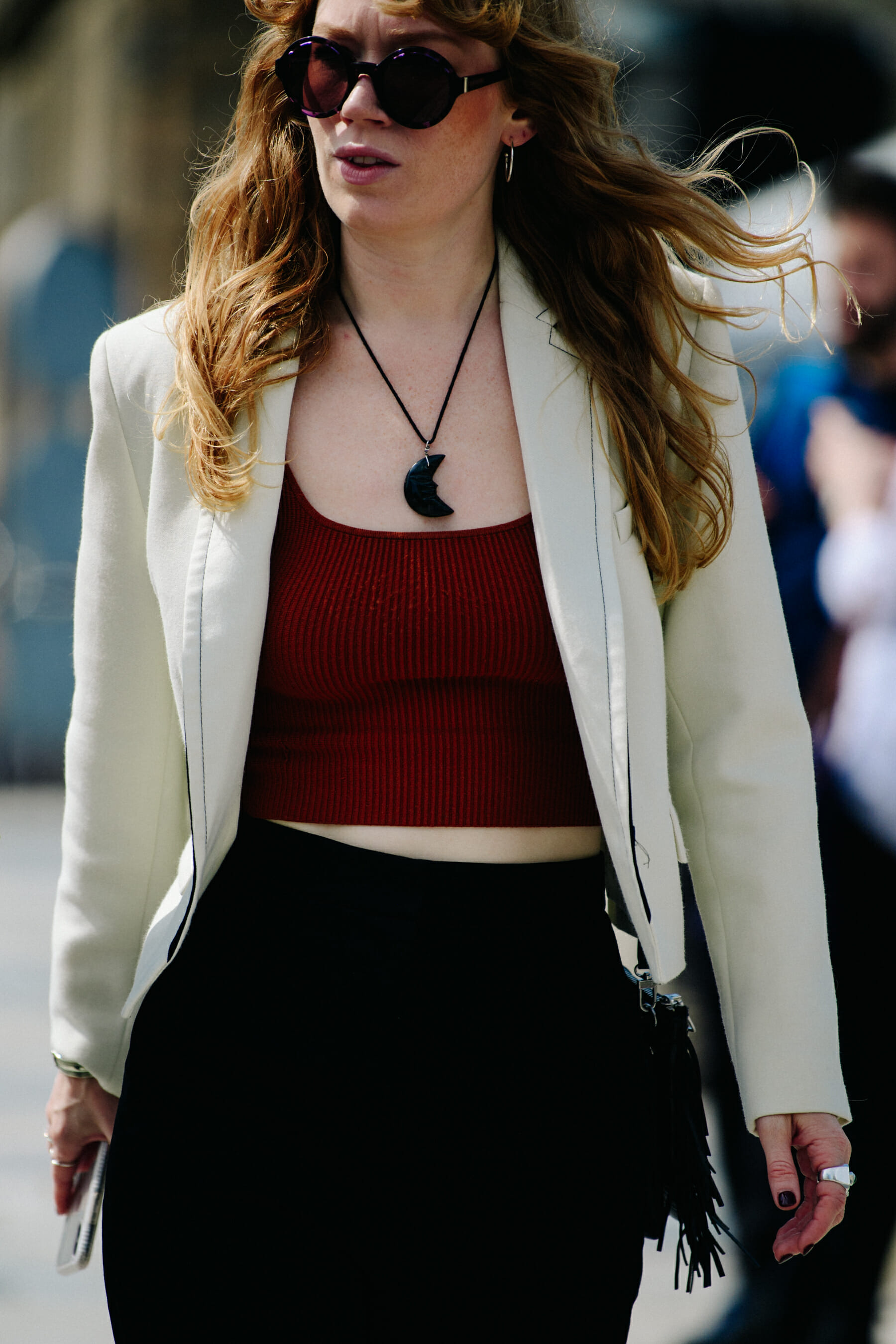 Woman wearing white blazer