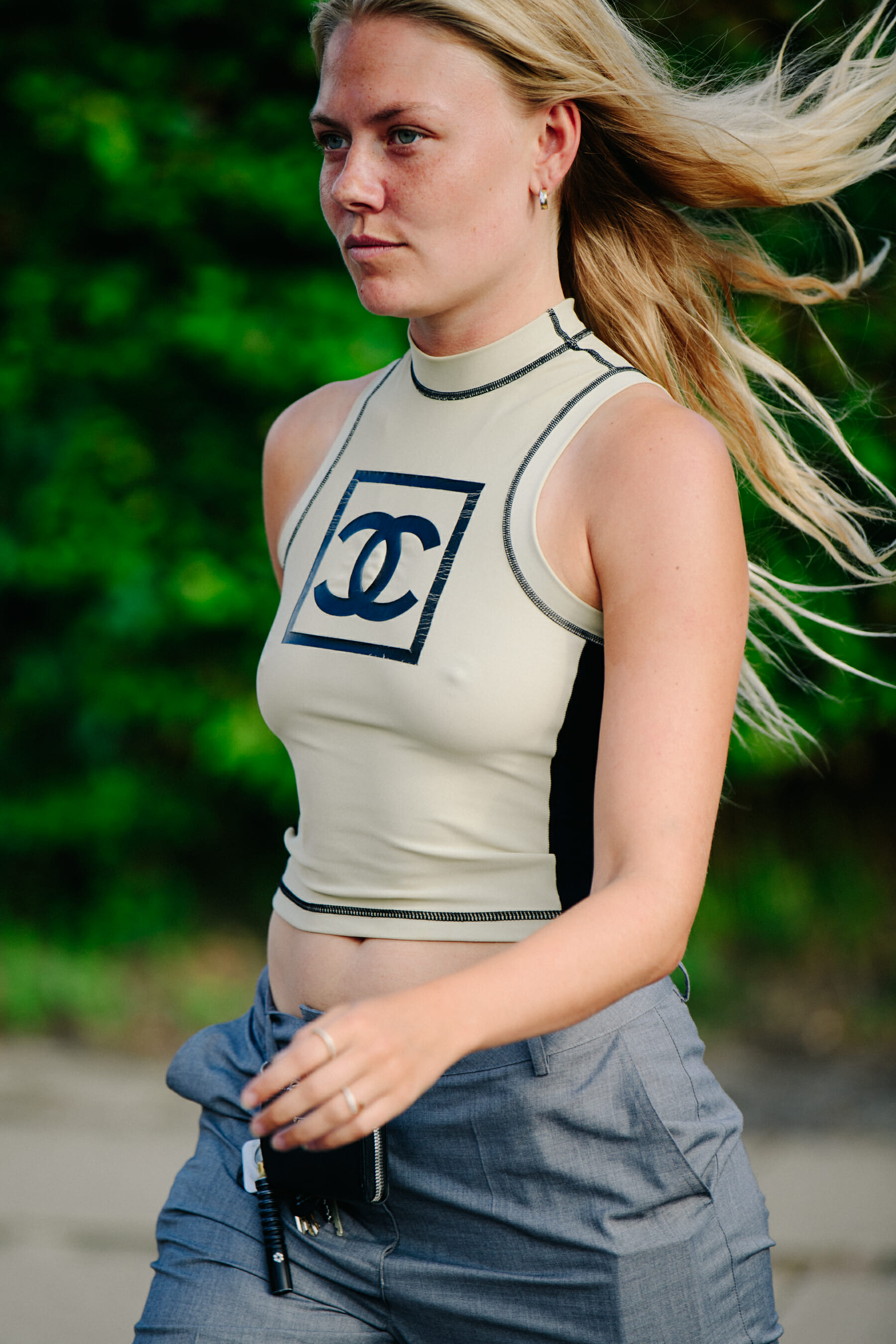 Woman wearing Chanel vest