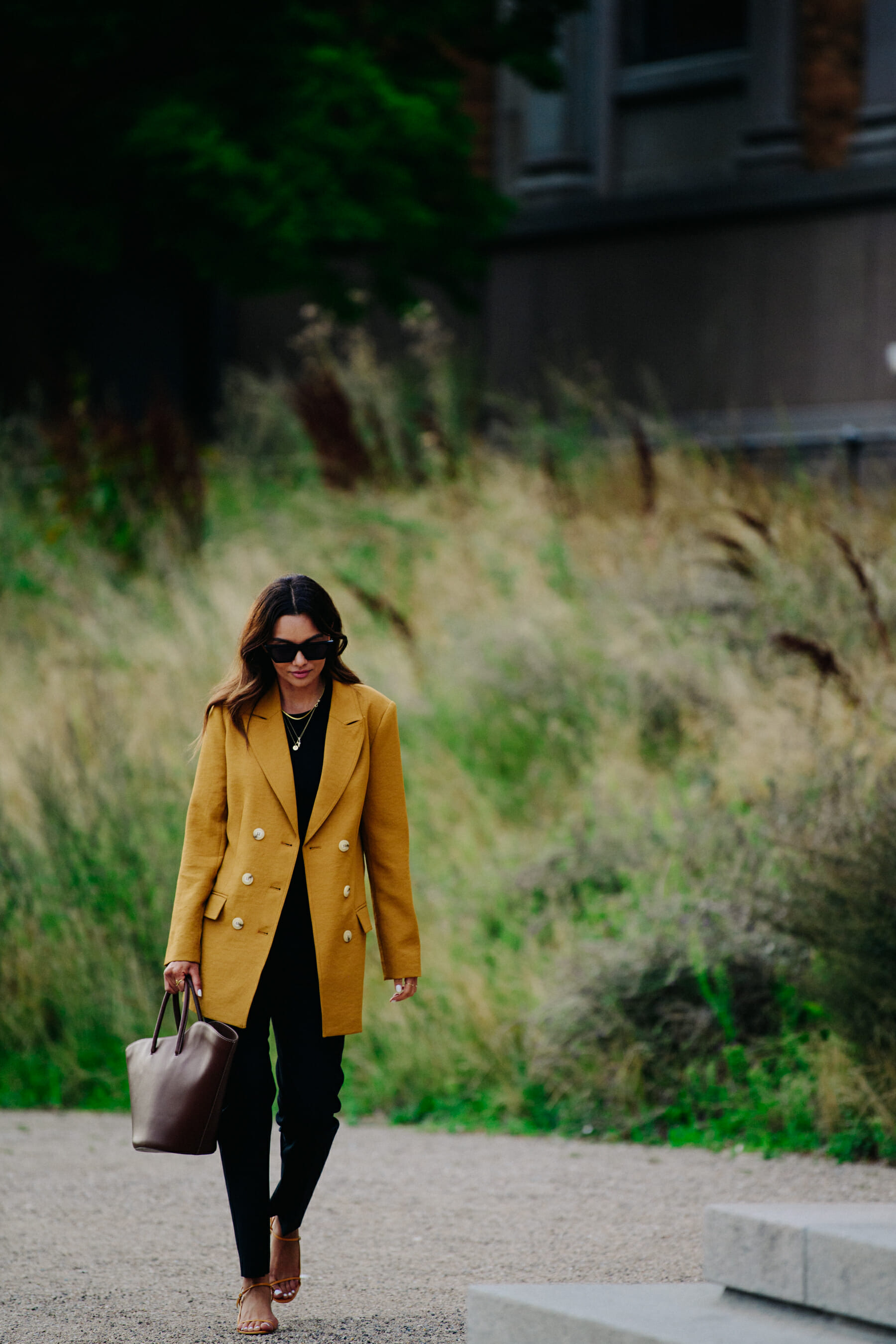 Woman wearing orange blazer