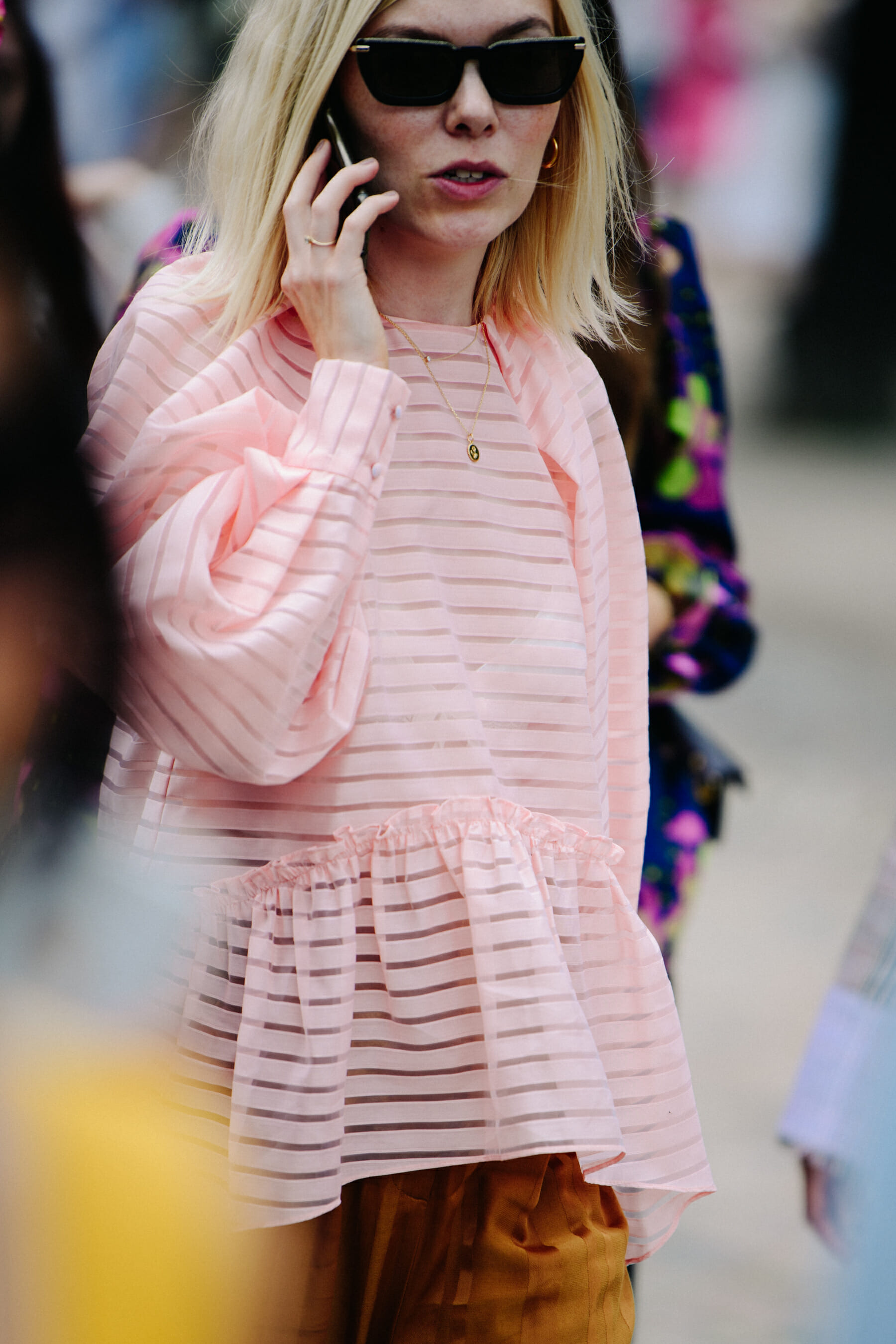 Woman wearing pink striped top